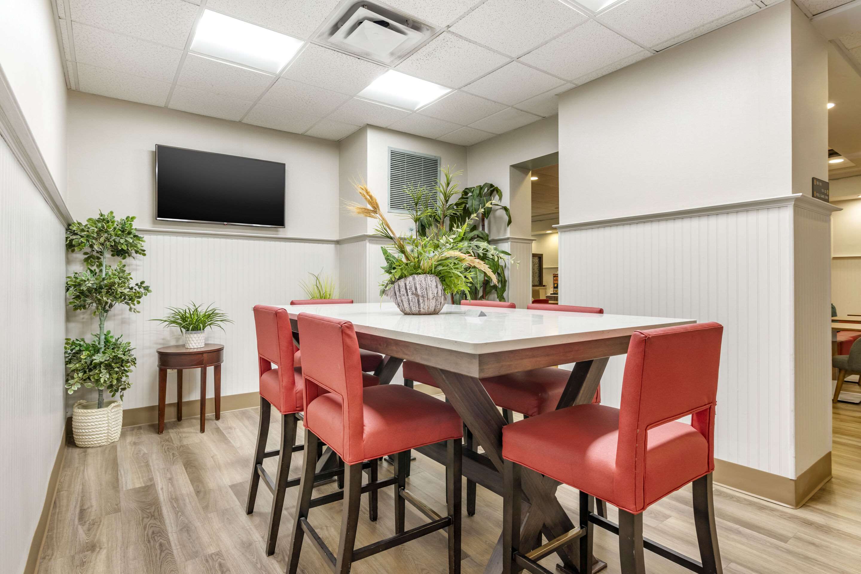 Enjoy breakfast in this seating area | Comfort Suites Ocean City West