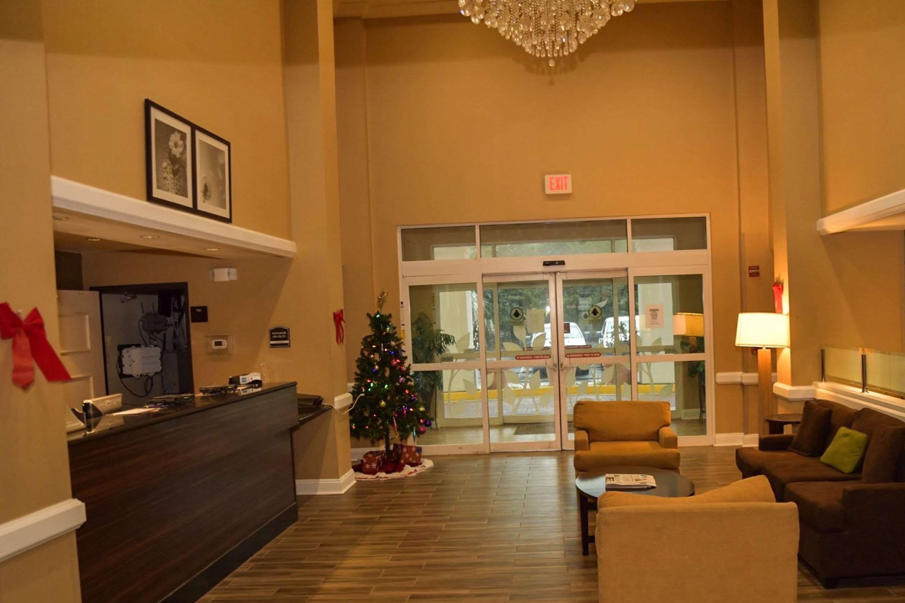 Spacious lobby with sitting area | Sleep Inn And Suites Laurel