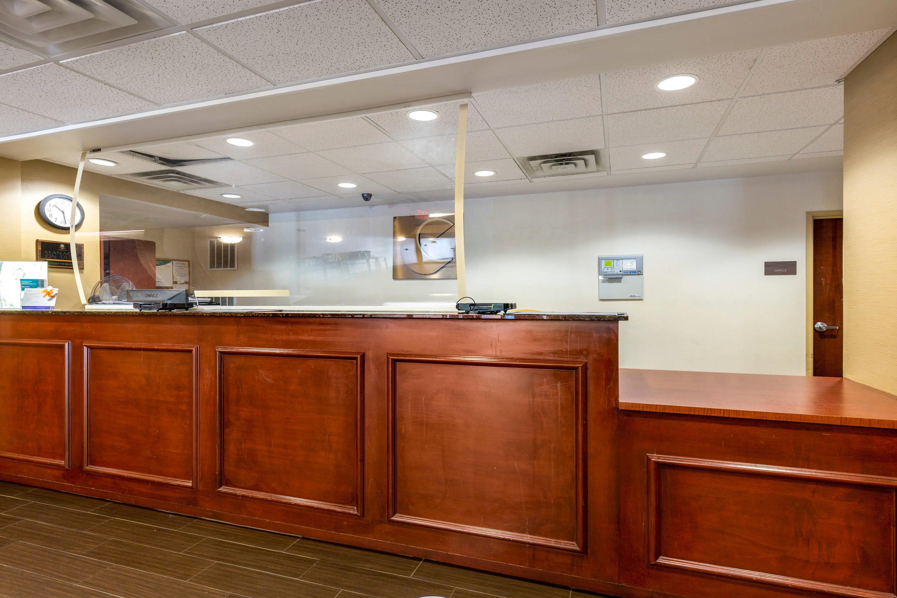 Front desk with friendly staff | Comfort Inn & Suites Cambridge