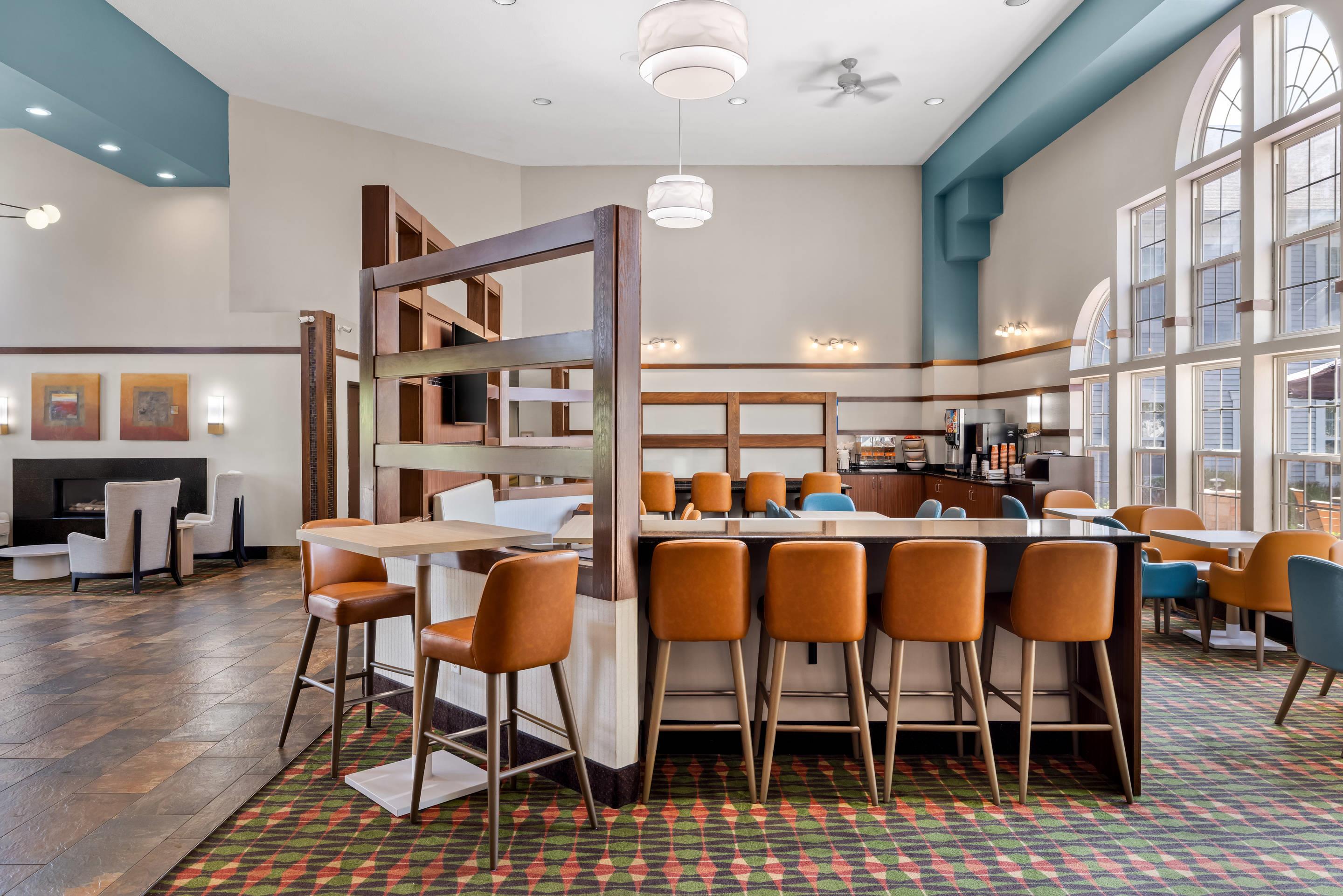 Enjoy breakfast in this seating area | Comfort Inn & Suites and Conference Center
