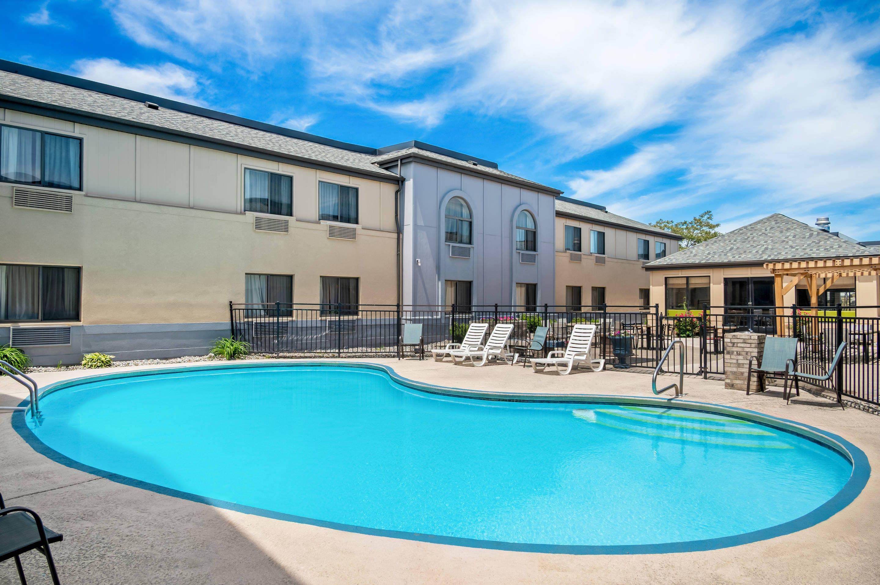 Outdoor pool | Quality Inn & Suites