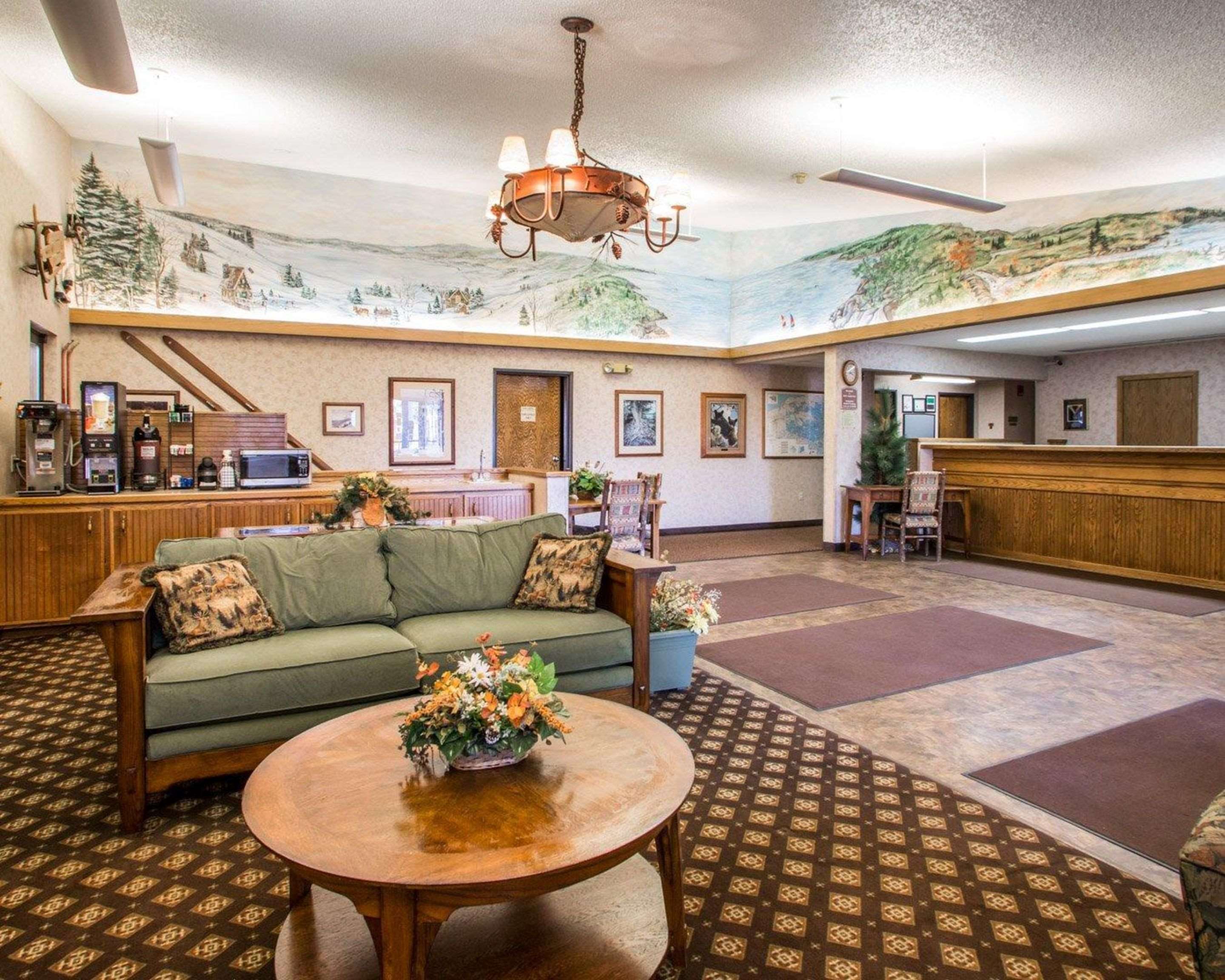 Spacious lobby with sitting area | Quality Inn