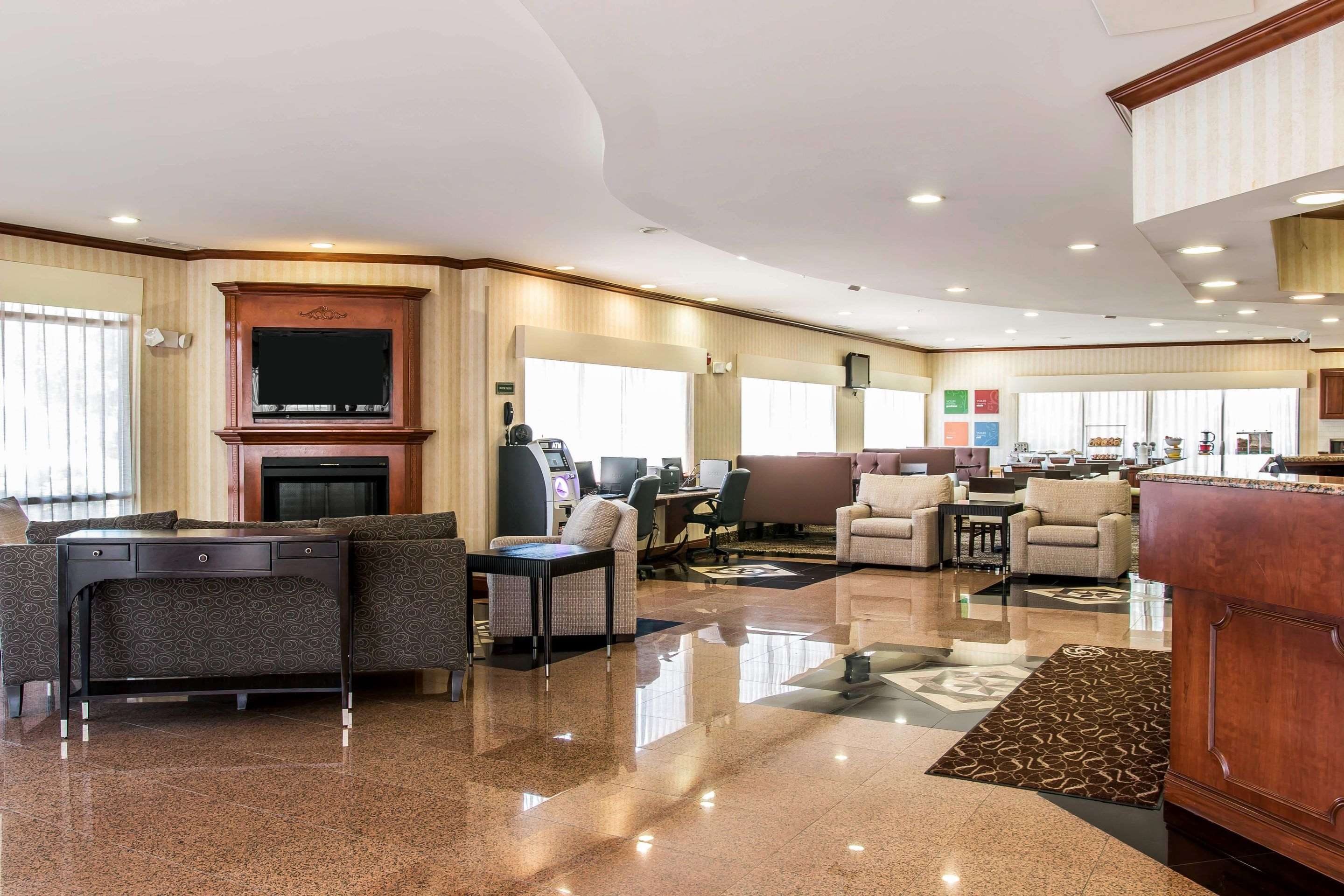 Spacious lobby with sitting area | Comfort Suites Canton