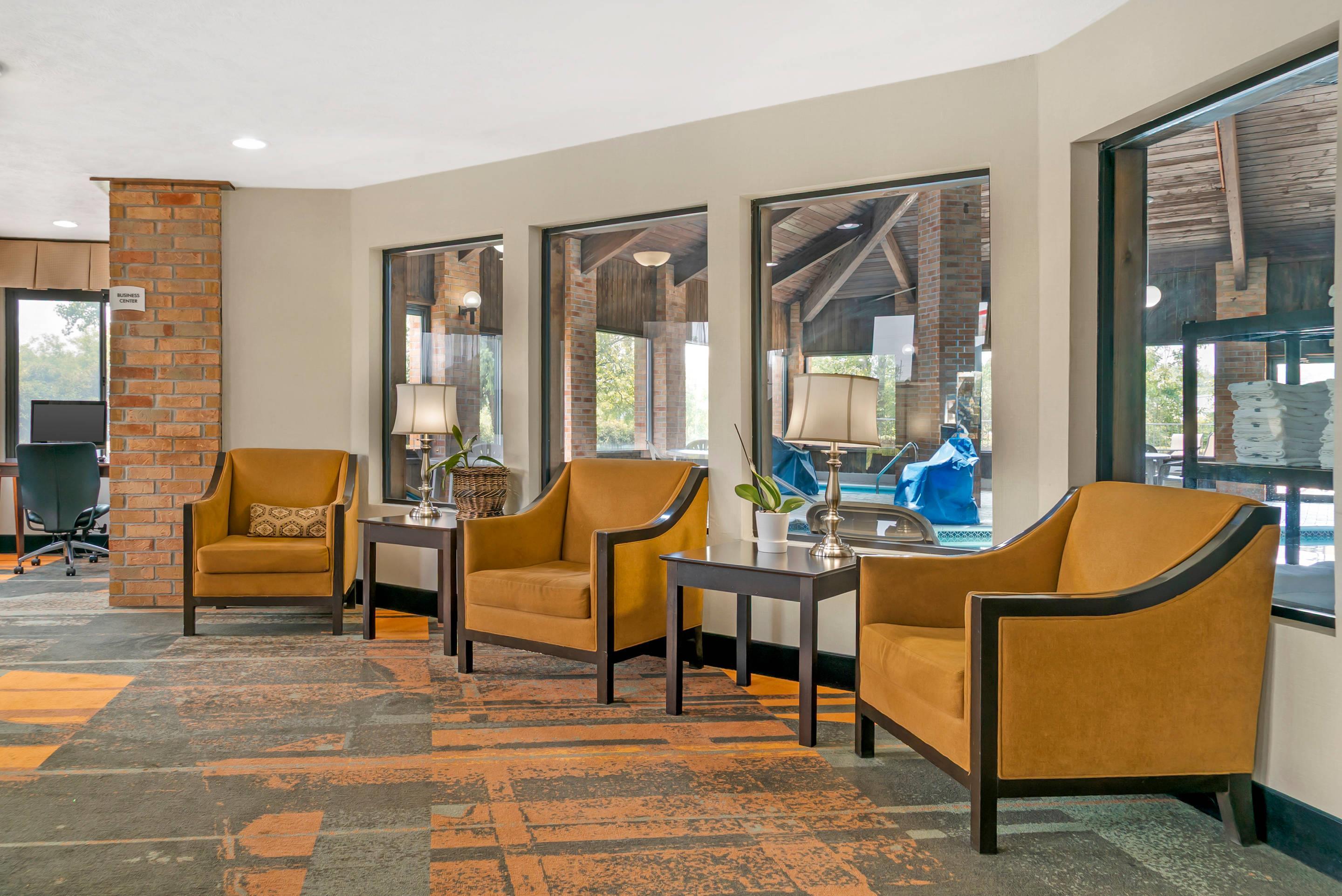Spacious lobby with sitting area | Quality Inn Grand Rapids South-Byron Center