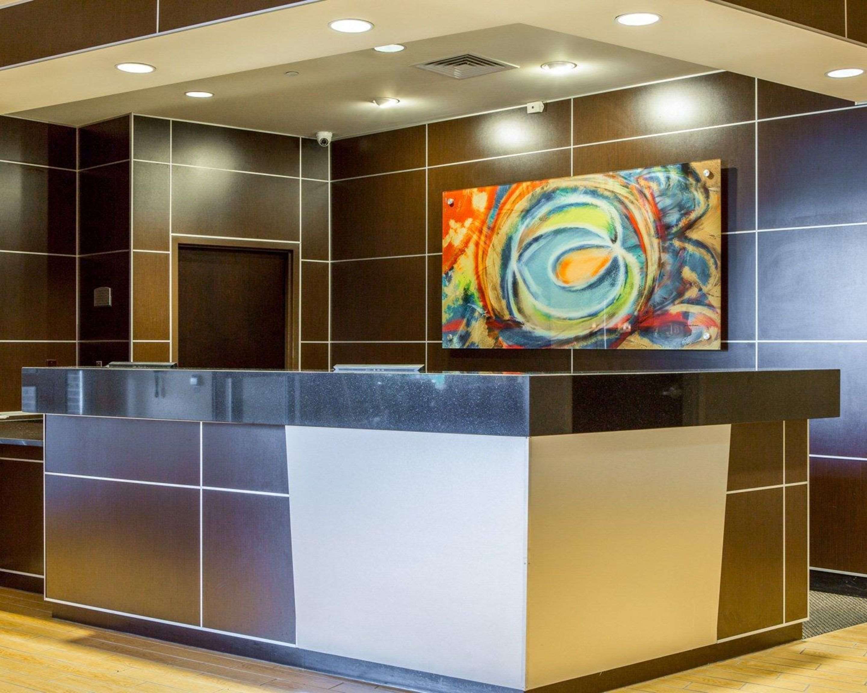 Modern front desk with a helpful and friendly staff | Cambria Hotel Traverse City