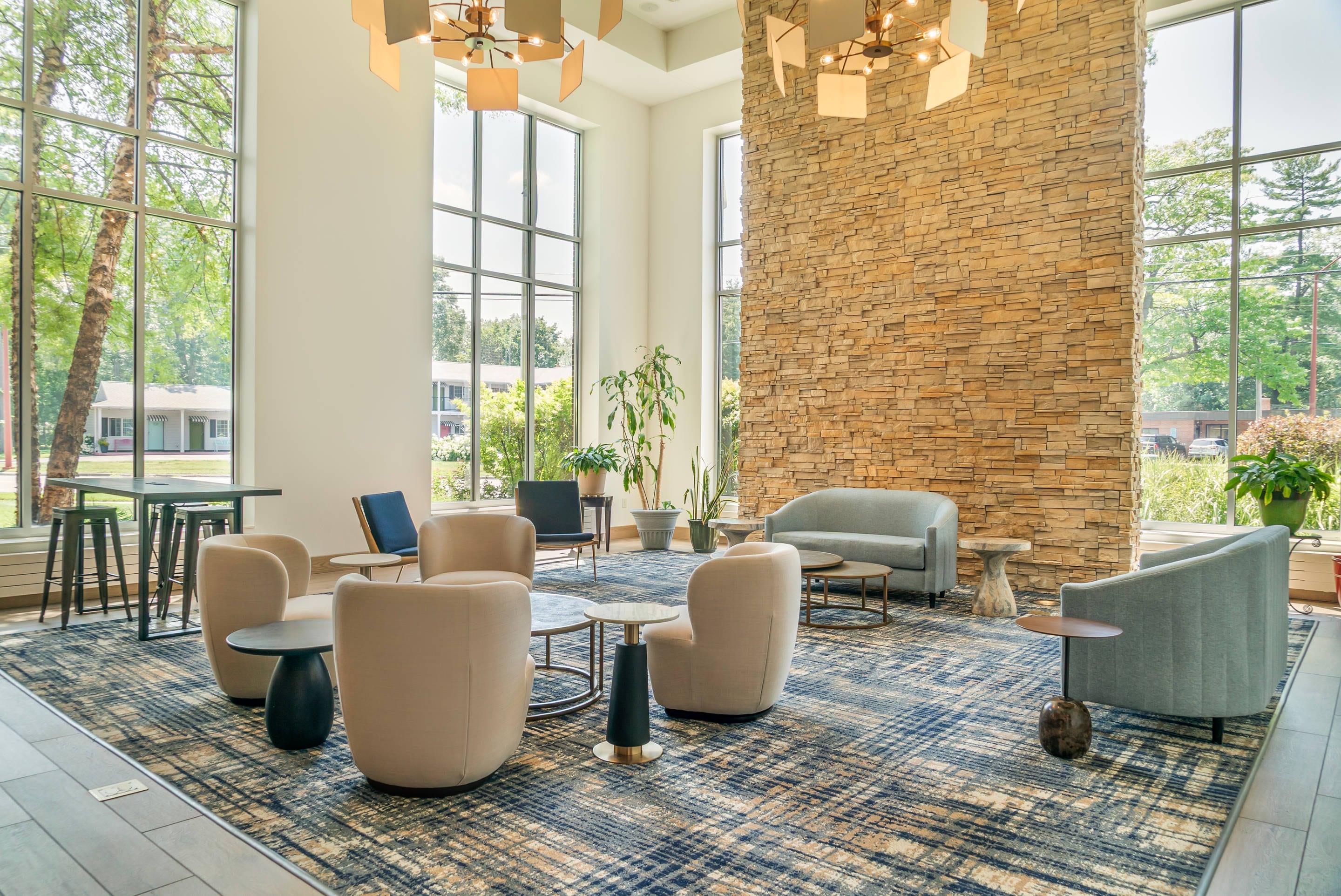 Spacious lobby with sitting area | Cambria Hotel Traverse City