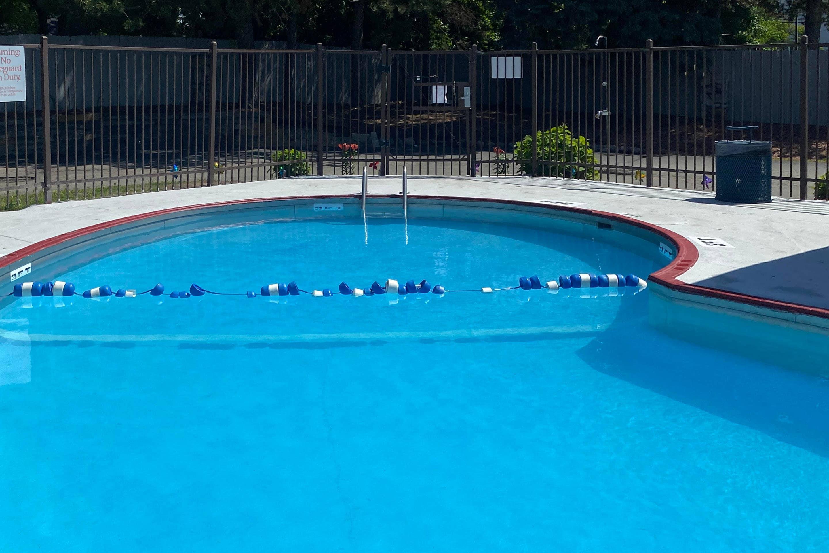 Outdoor pool | Rodeway Inn Auburn Hills