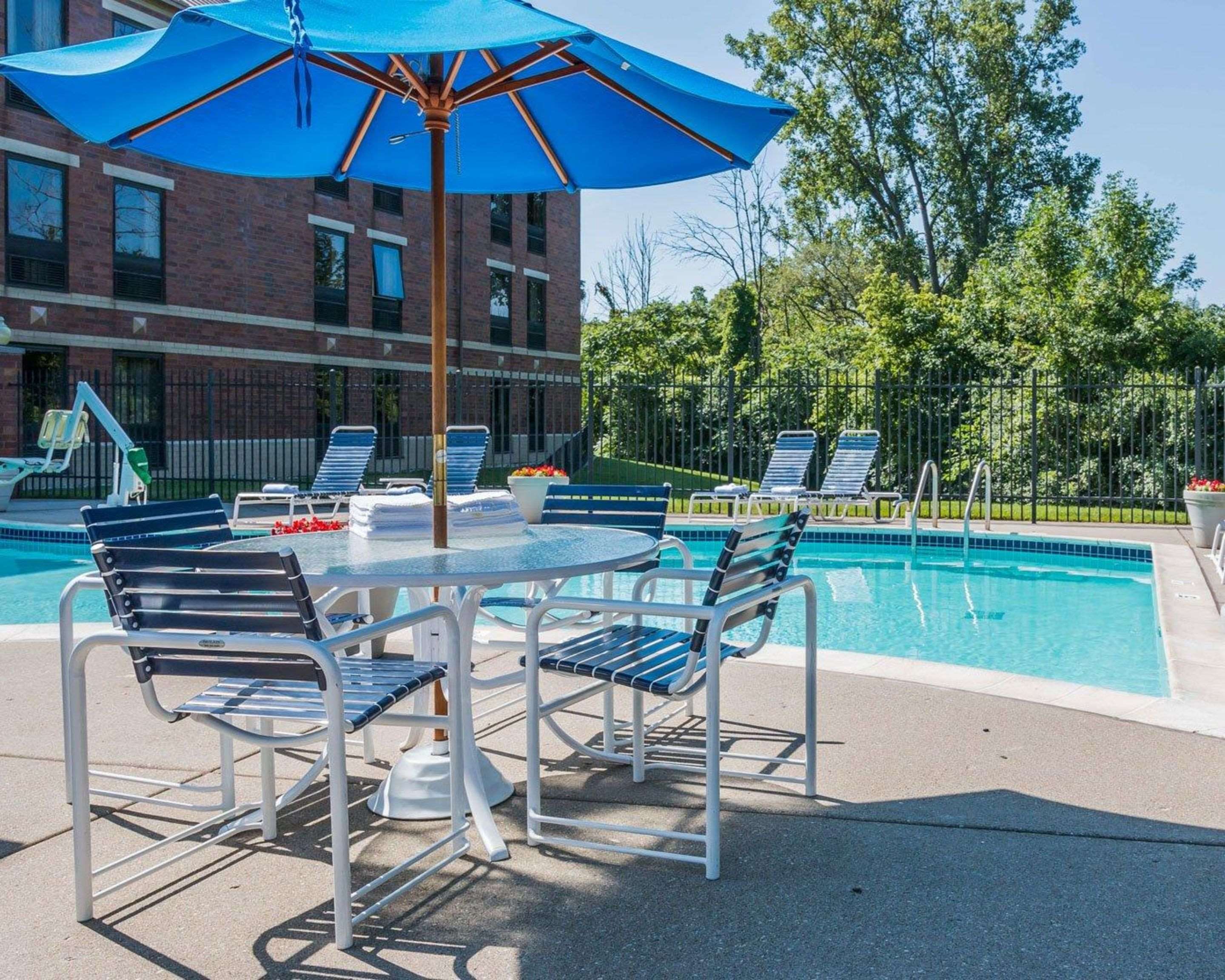 Relax by the pool | Quality Inn