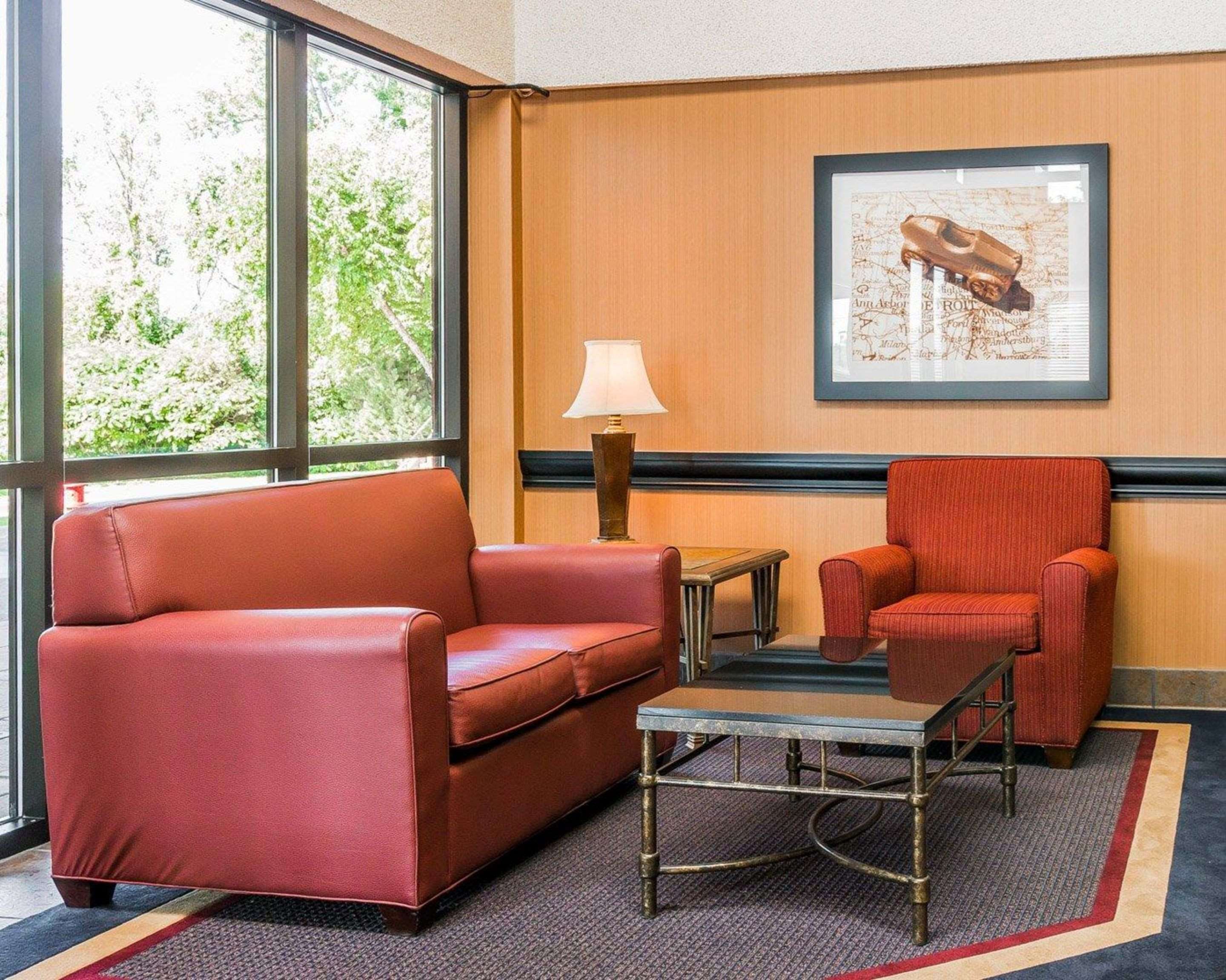 Lobby with sitting area | Quality Inn