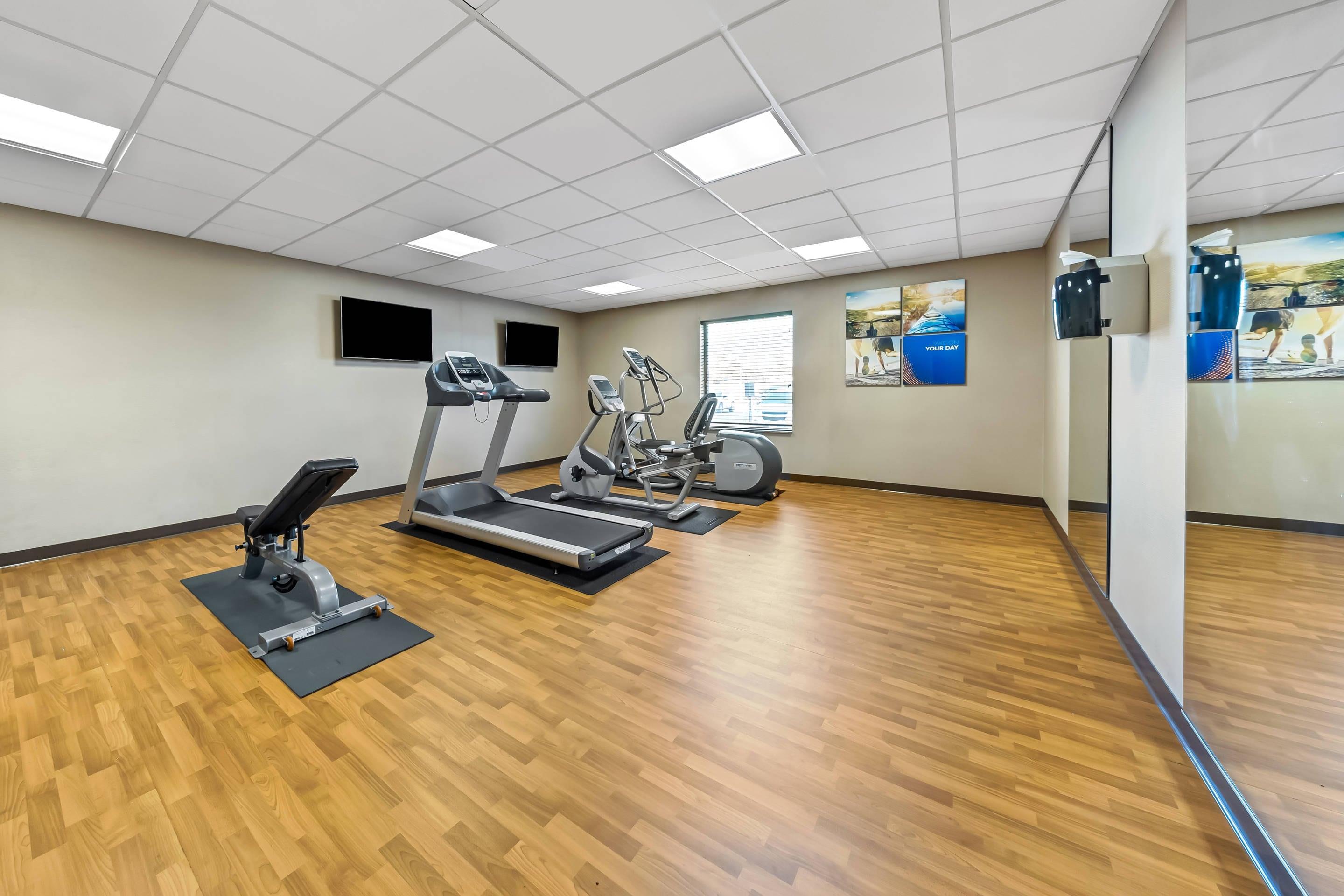Exercise room with cardio equipment | Comfort Inn & Suites West - Medical Center