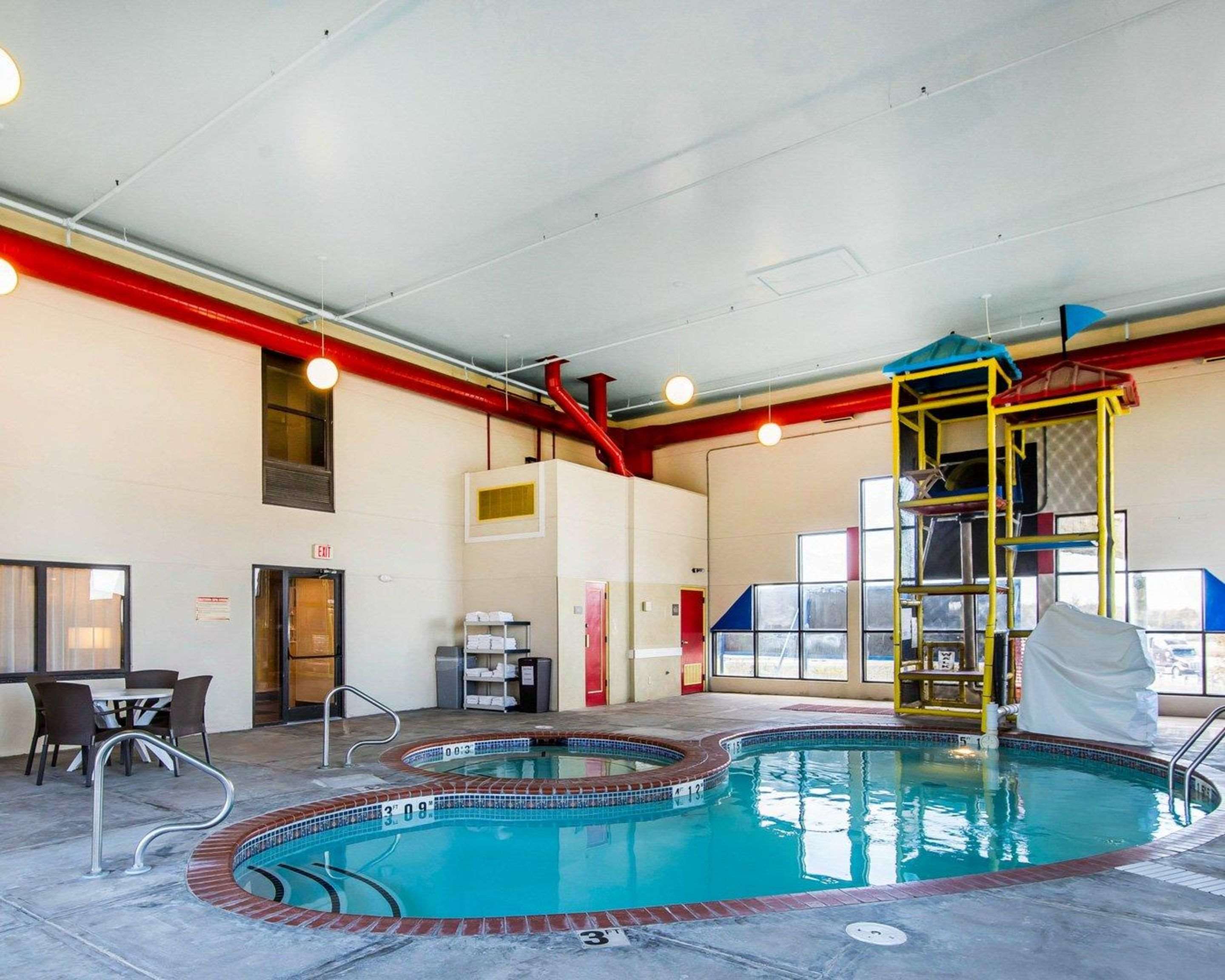 Indoor pool with water slide | Quality Inn Cameron