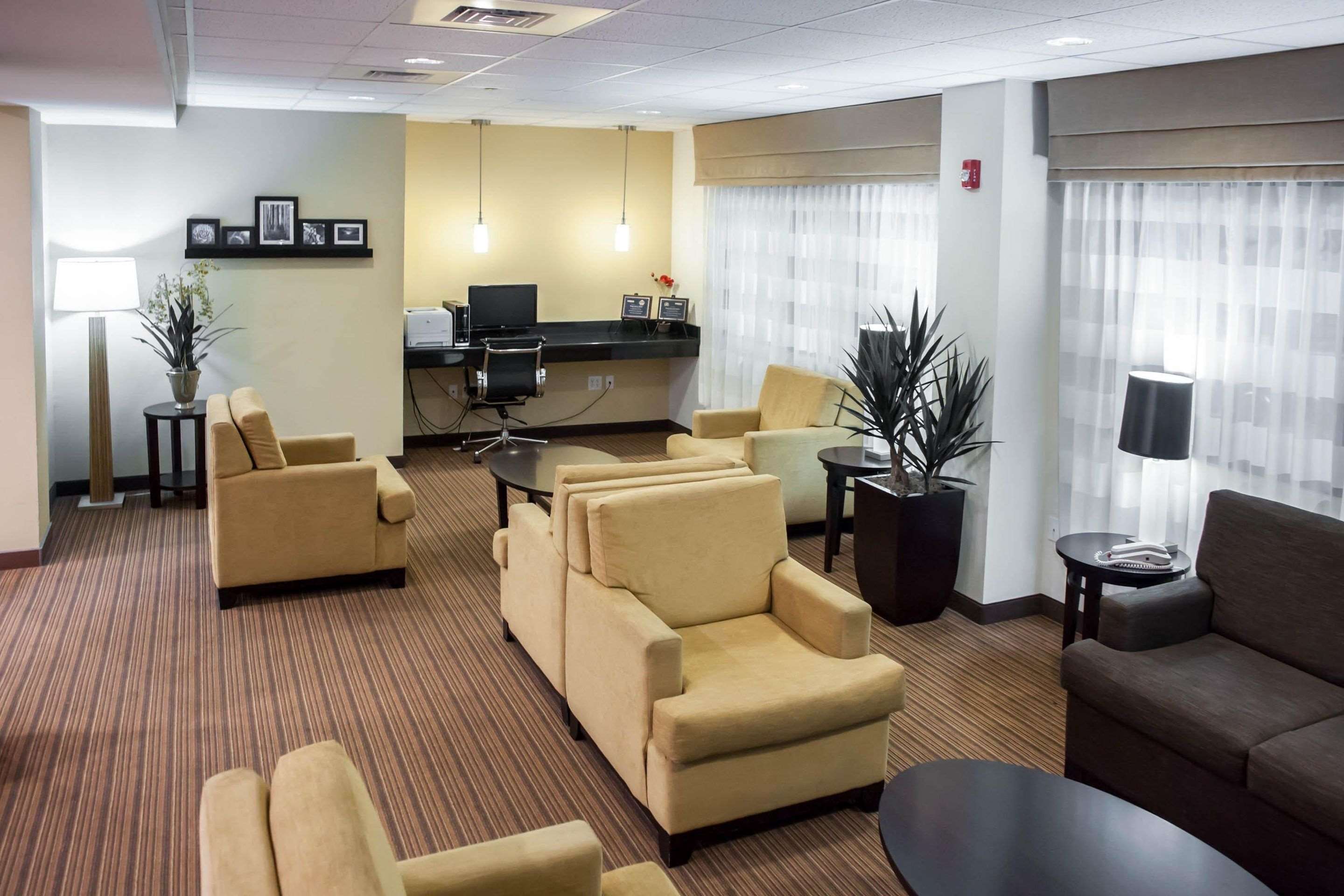 Spacious lobby with sitting area | Sleep Inn & Suites Indoor Waterpark
