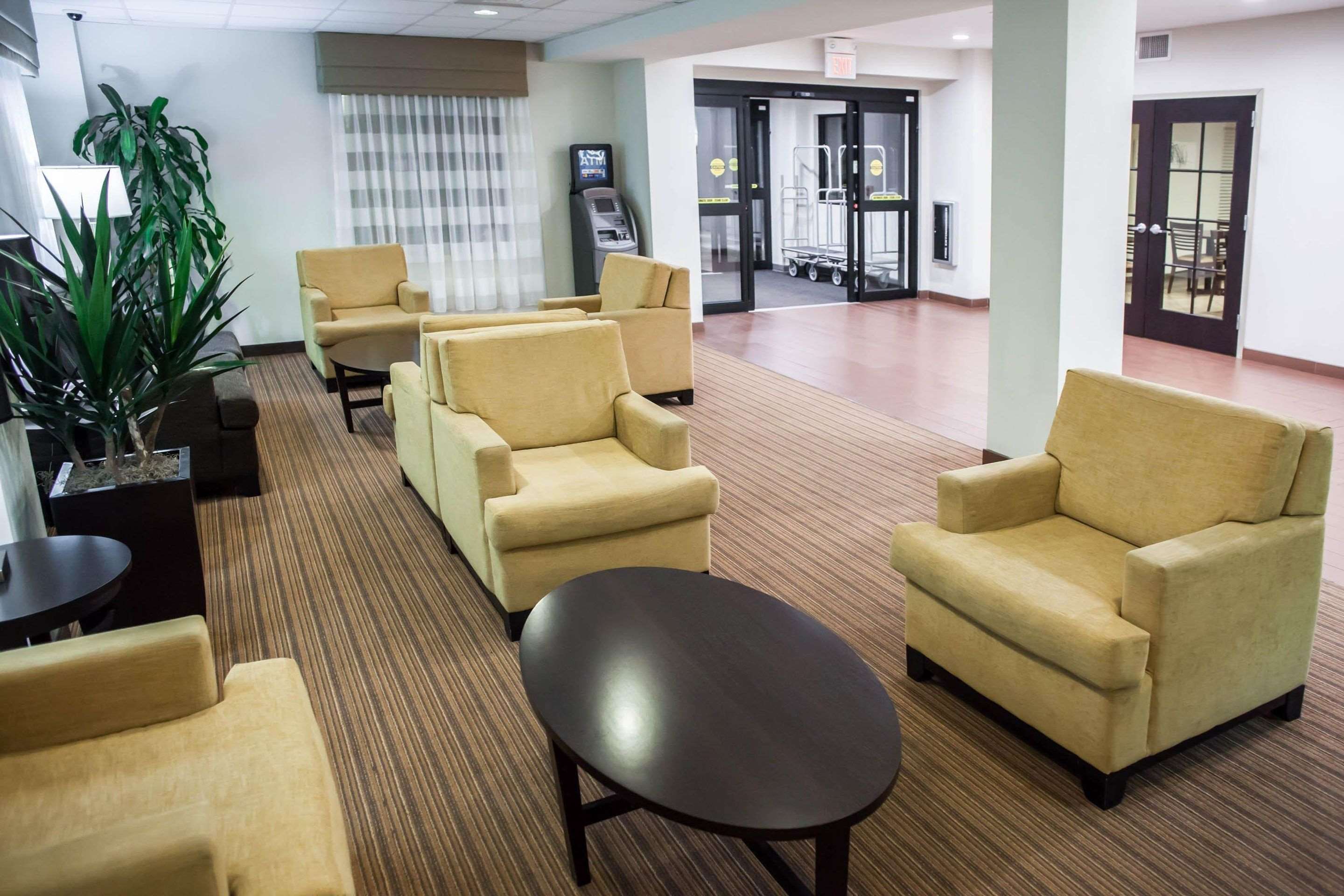 Spacious lobby with sitting area | Sleep Inn & Suites Indoor Waterpark