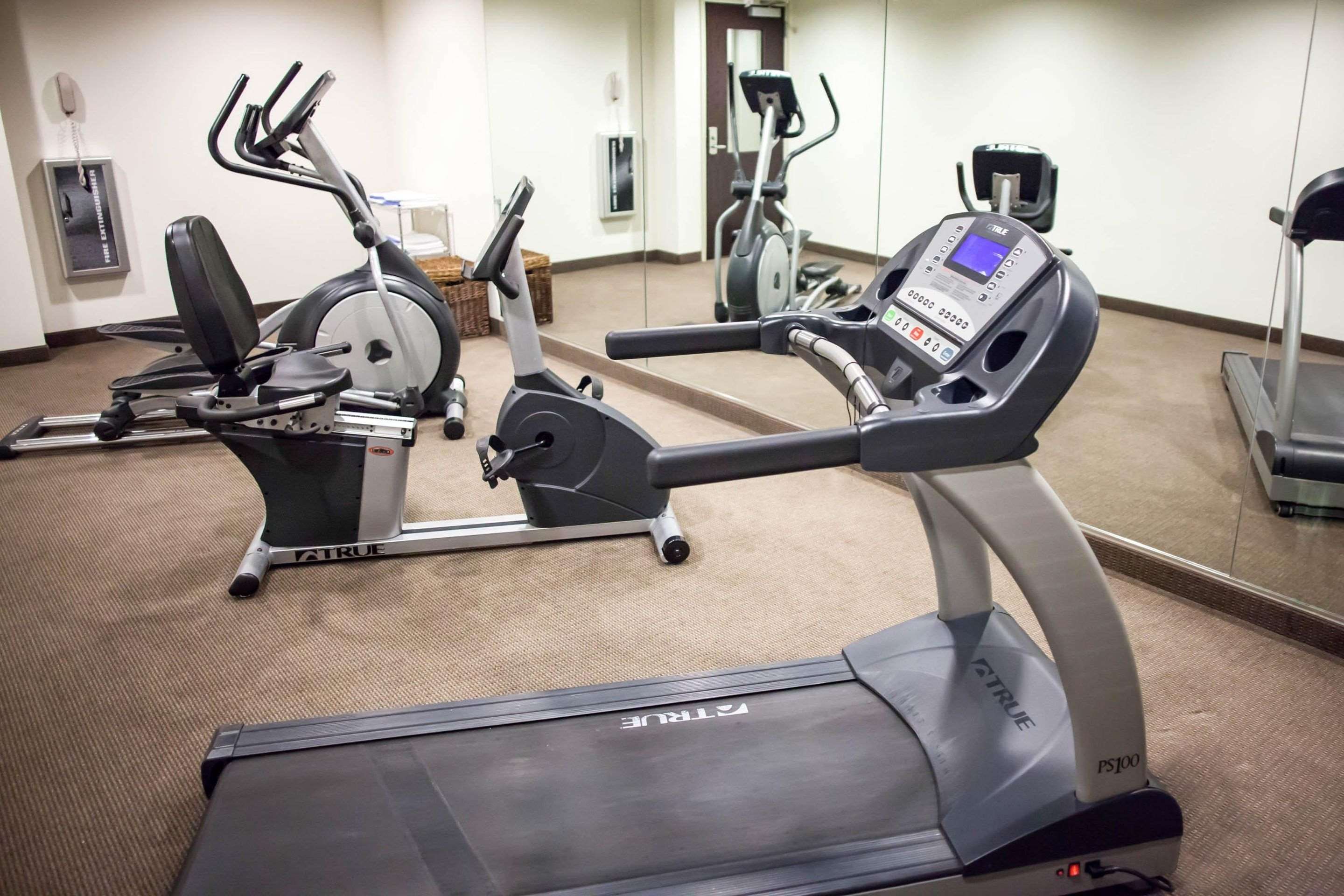 Exercise room with cardio equipment | Sleep Inn & Suites Indoor Waterpark