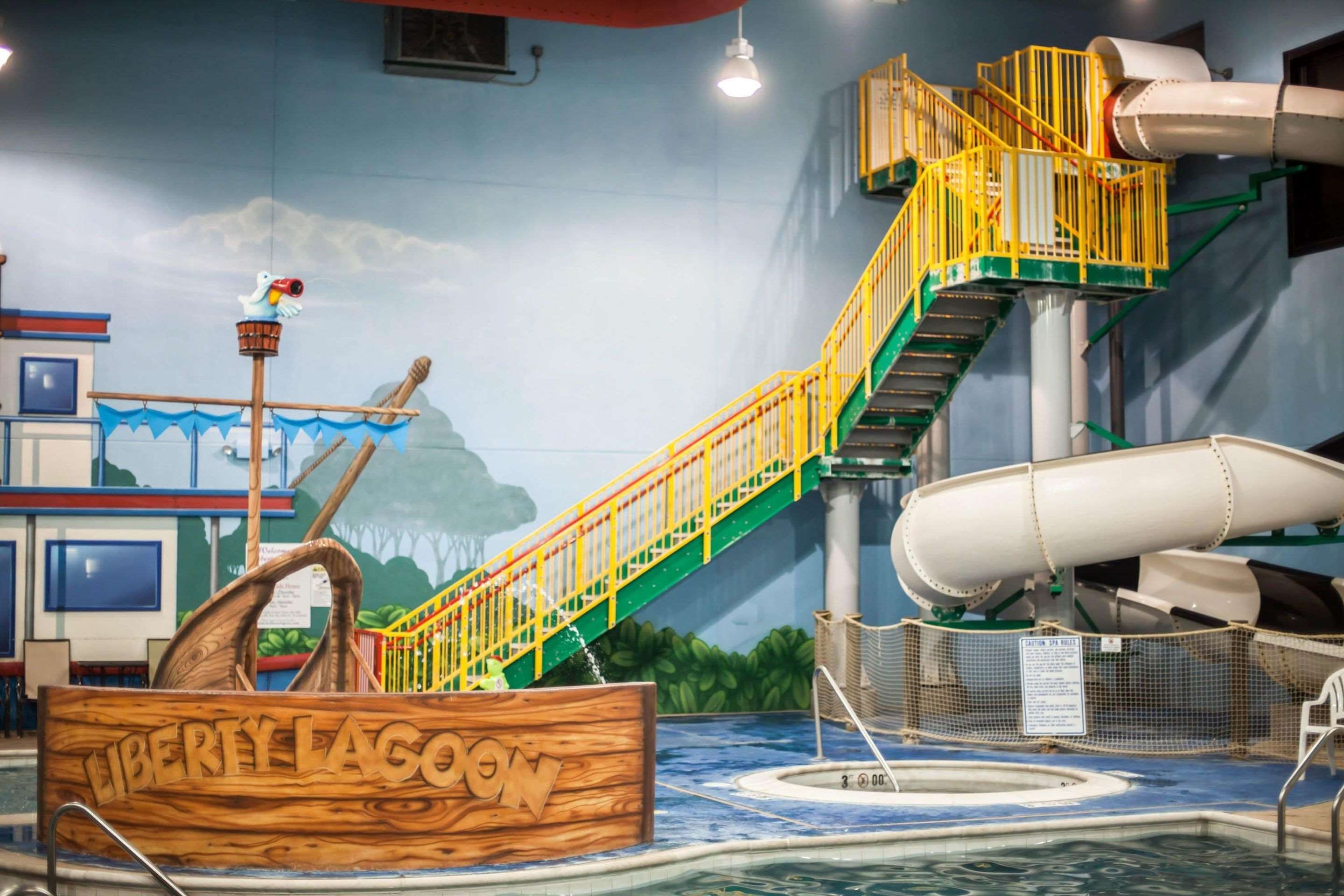 Indoor pool with water slide | Sleep Inn & Suites Indoor Waterpark