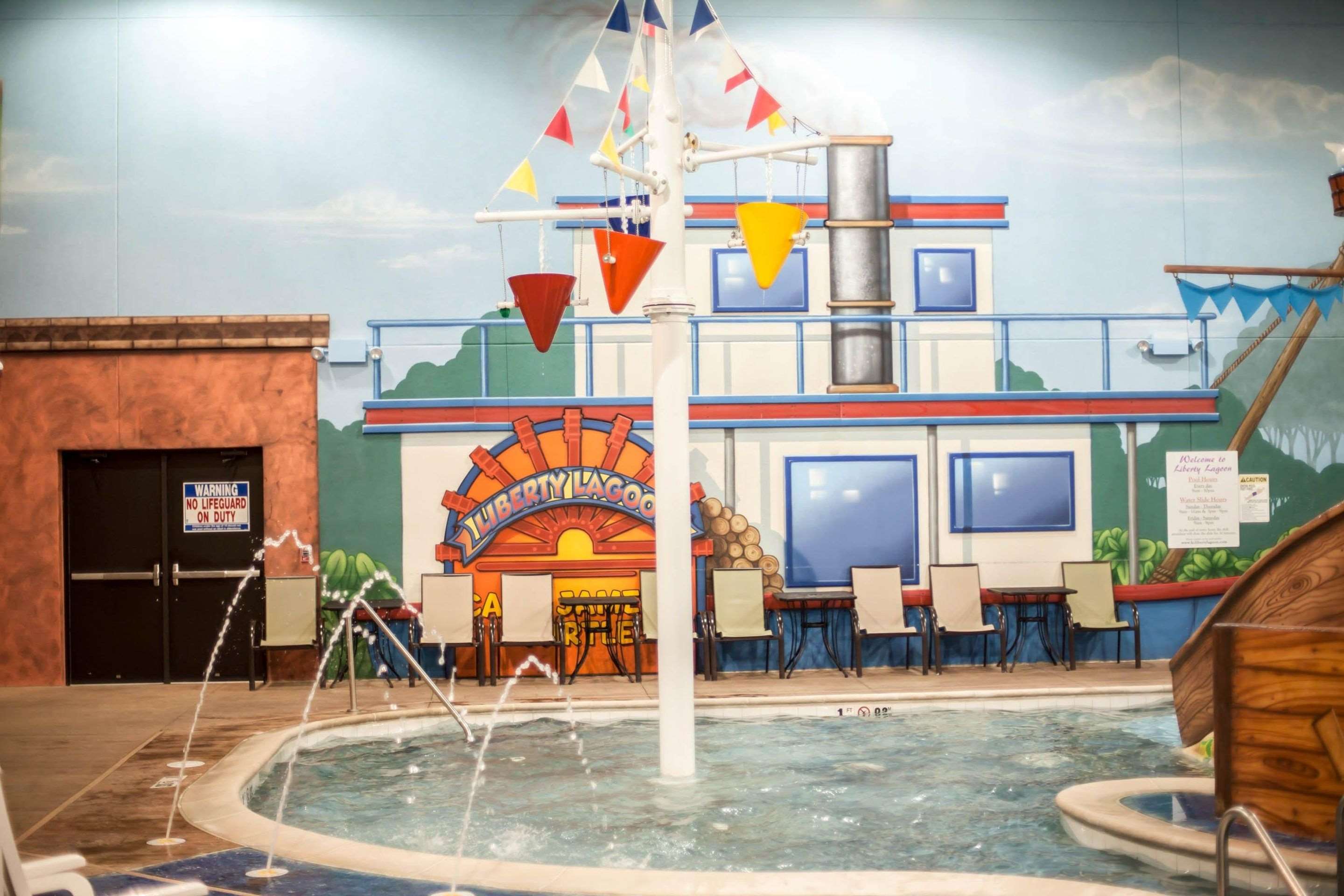 Indoor pool with water slide | Sleep Inn & Suites Indoor Waterpark