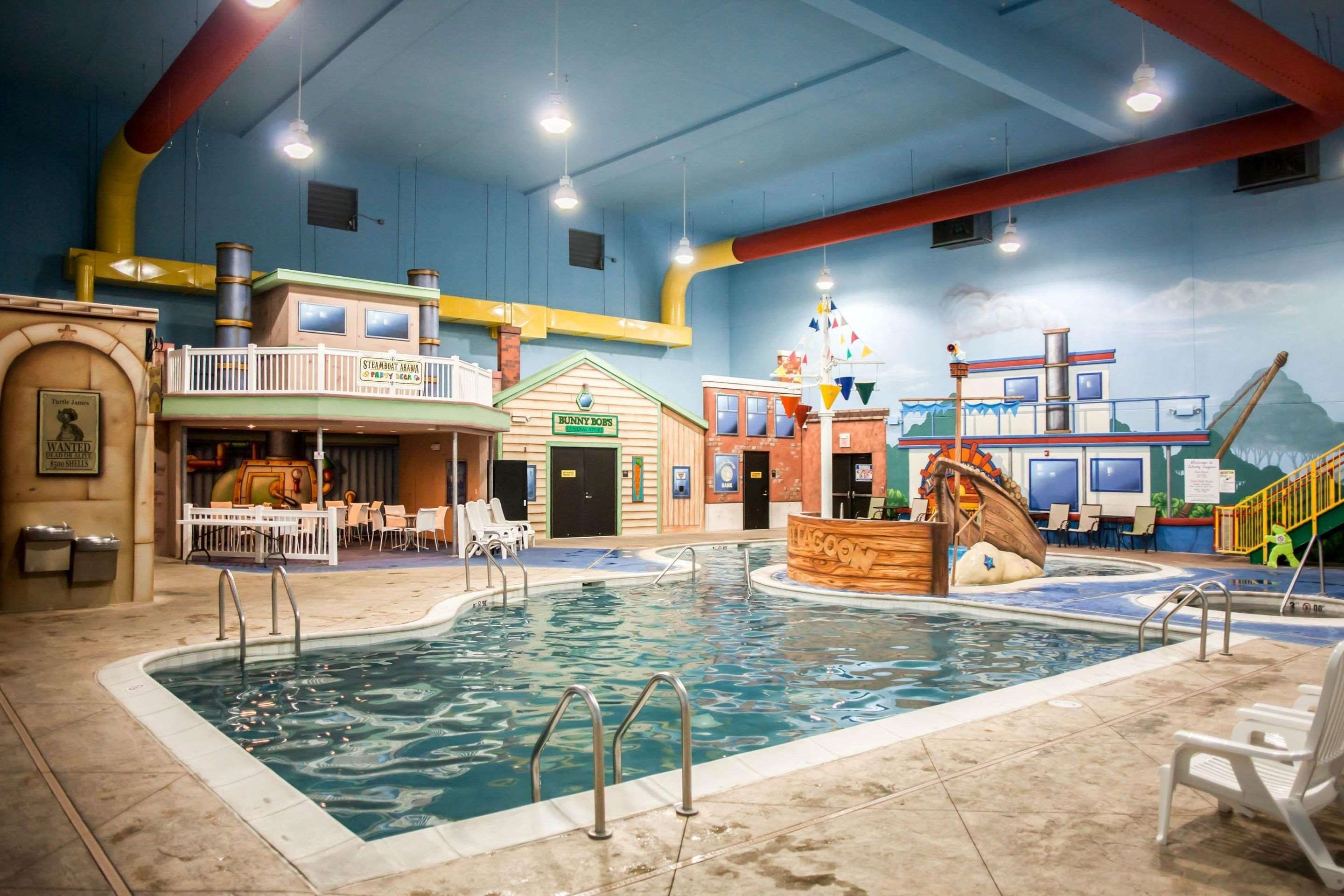 Indoor pool with water slide | Sleep Inn & Suites Indoor Waterpark