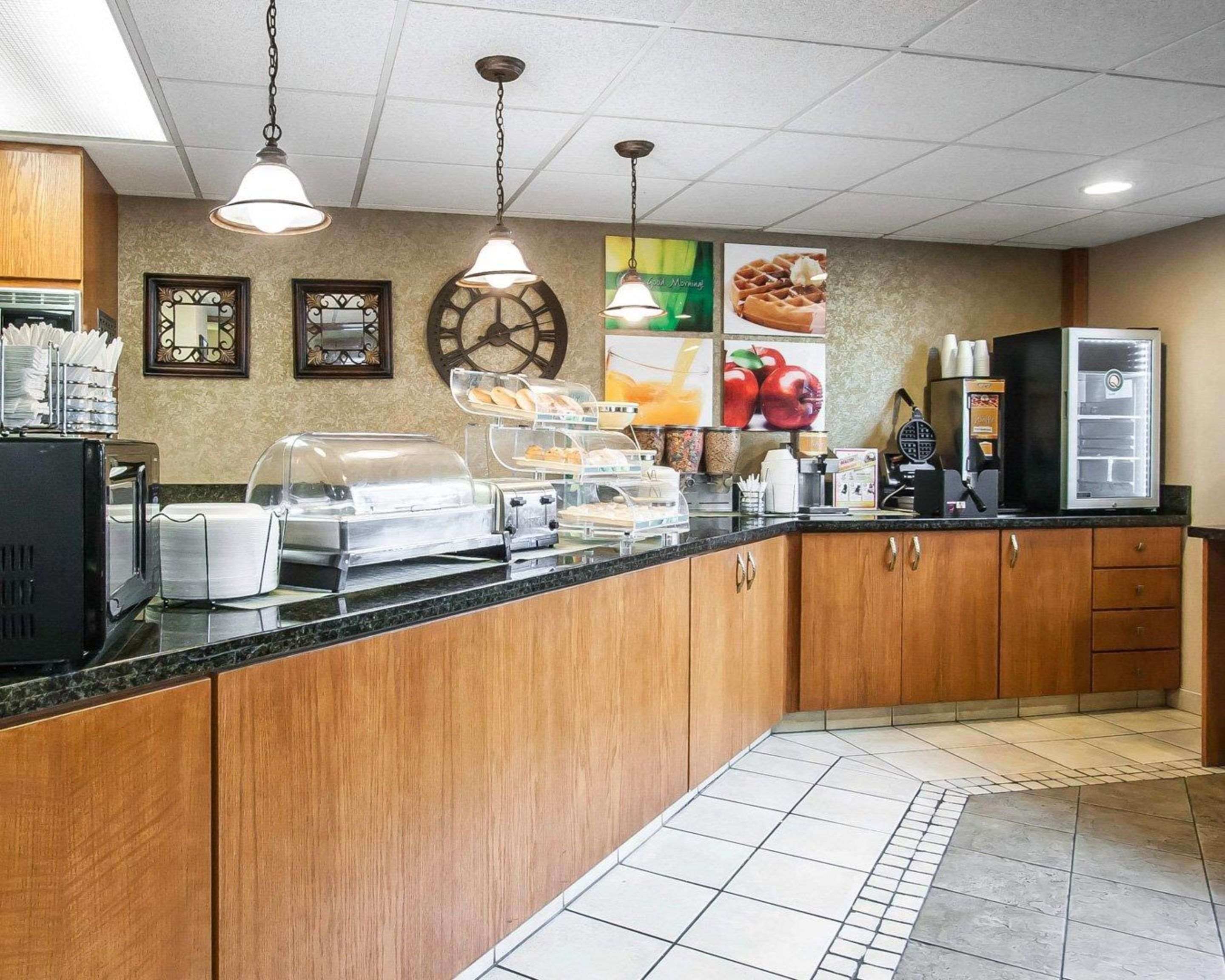 Enjoy breakfast in this seating area | Quality Inn & Suites North Springfield