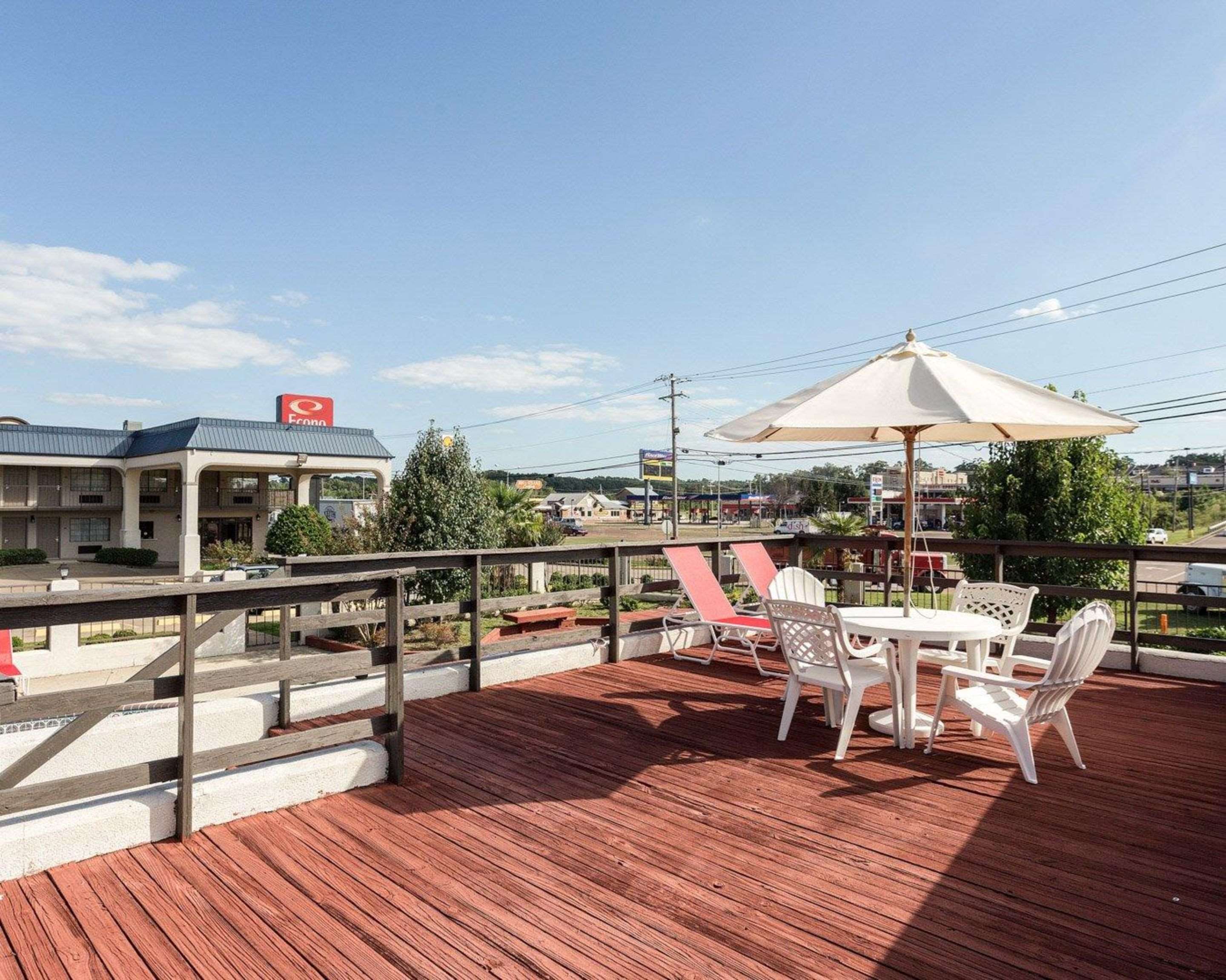 Relax on the hotel patio | Econo Lodge Grenada