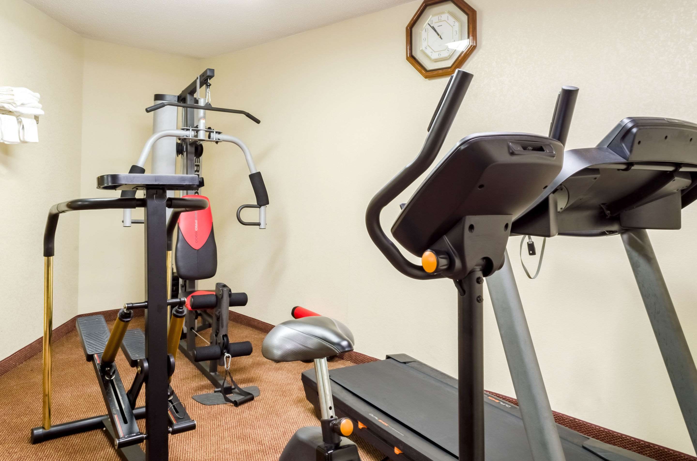 Exercise room with cardio equipment | Quality Inn