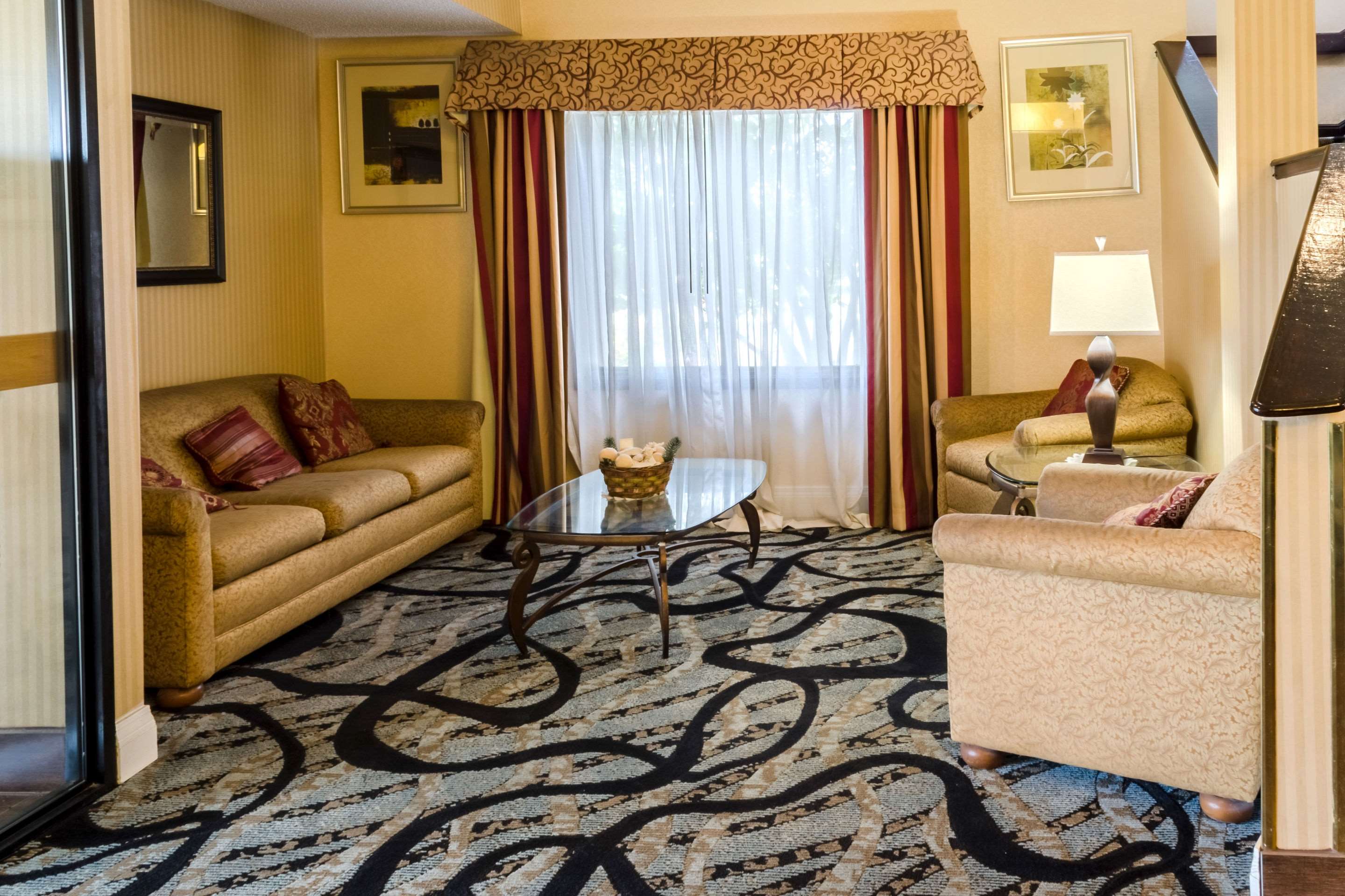 Spacious lobby with sitting area | Quality Inn