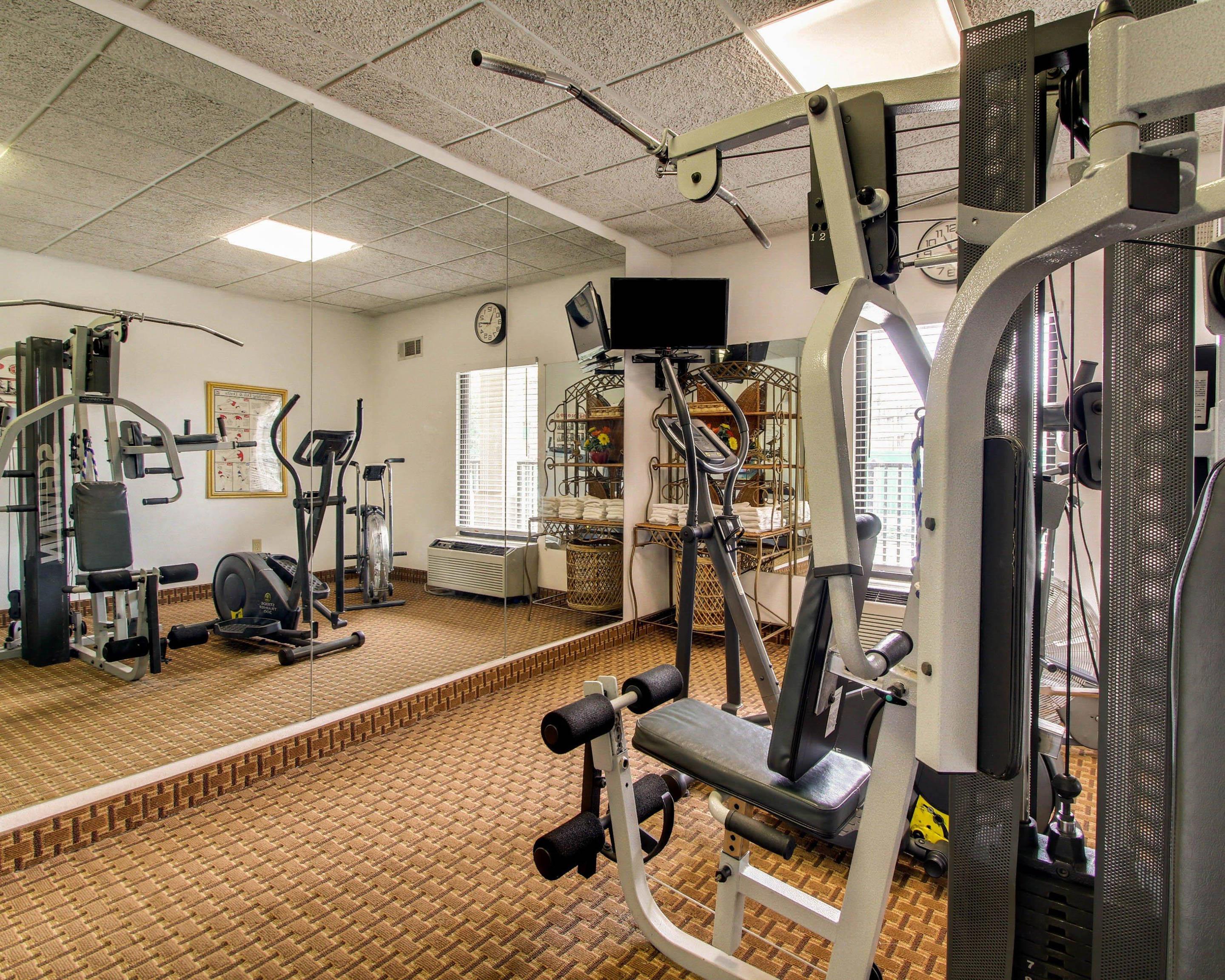 Fitness center with television | Quality Inn & Suites