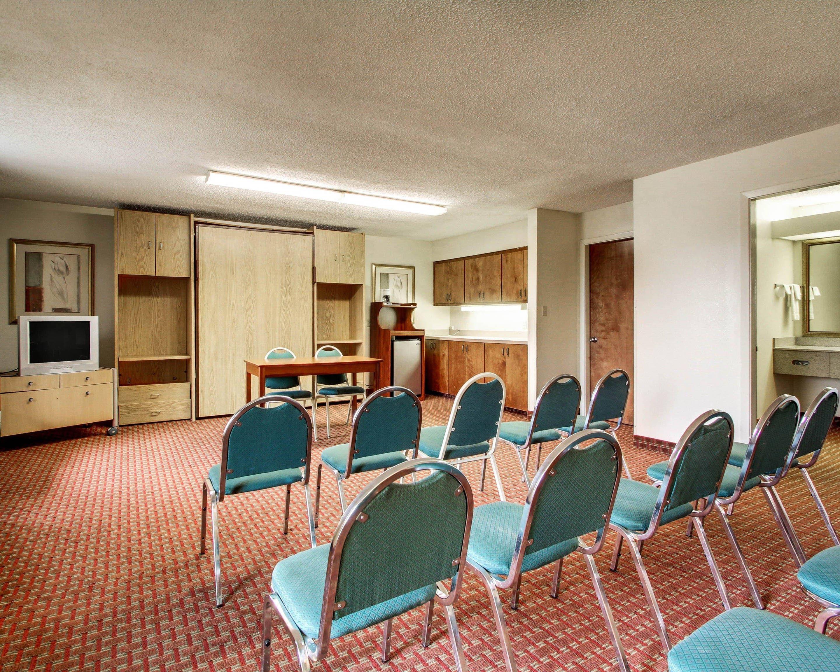 Meeting room with theater-style setup | Quality Inn & Suites