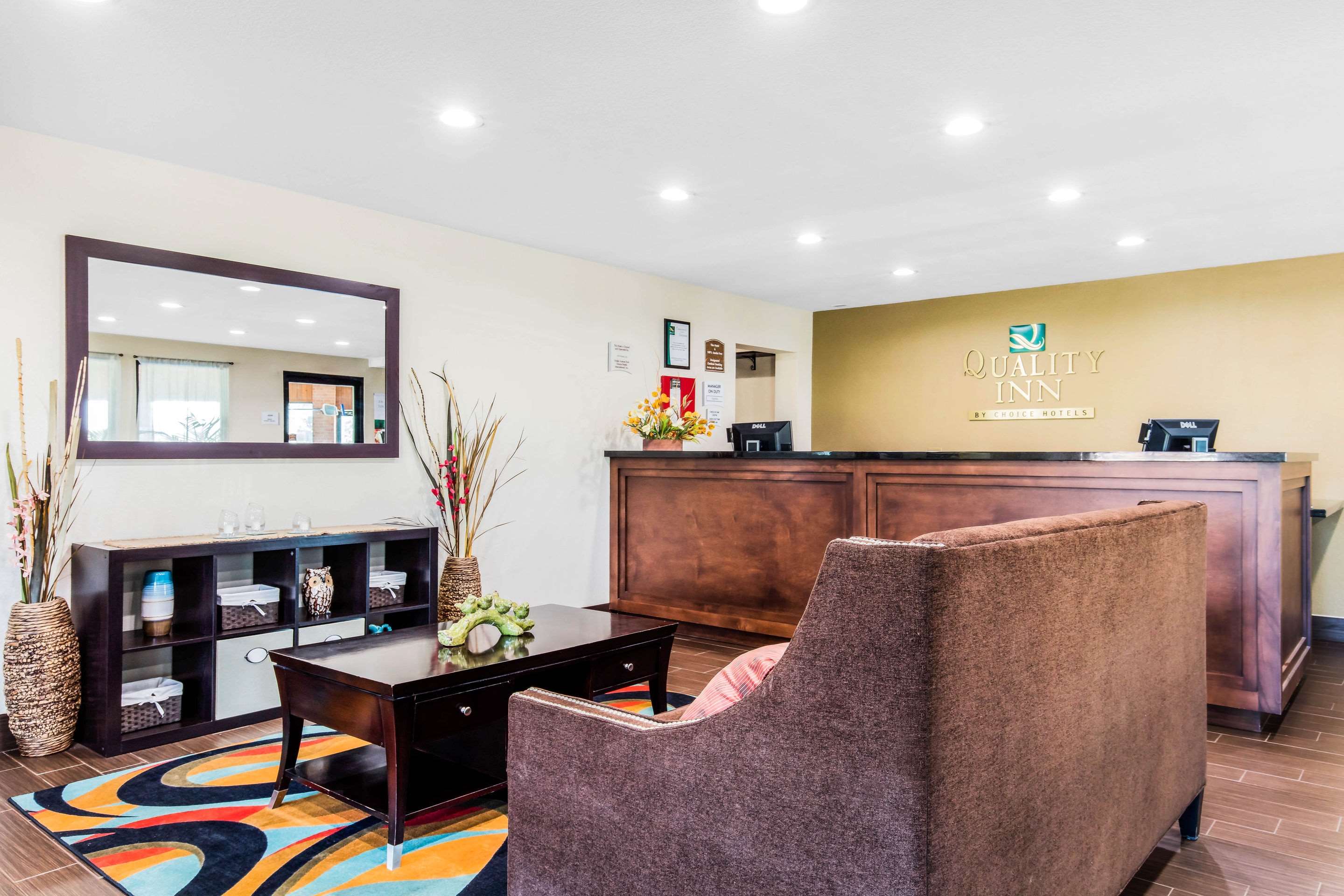 Spacious lobby with sitting area | Quality Inn