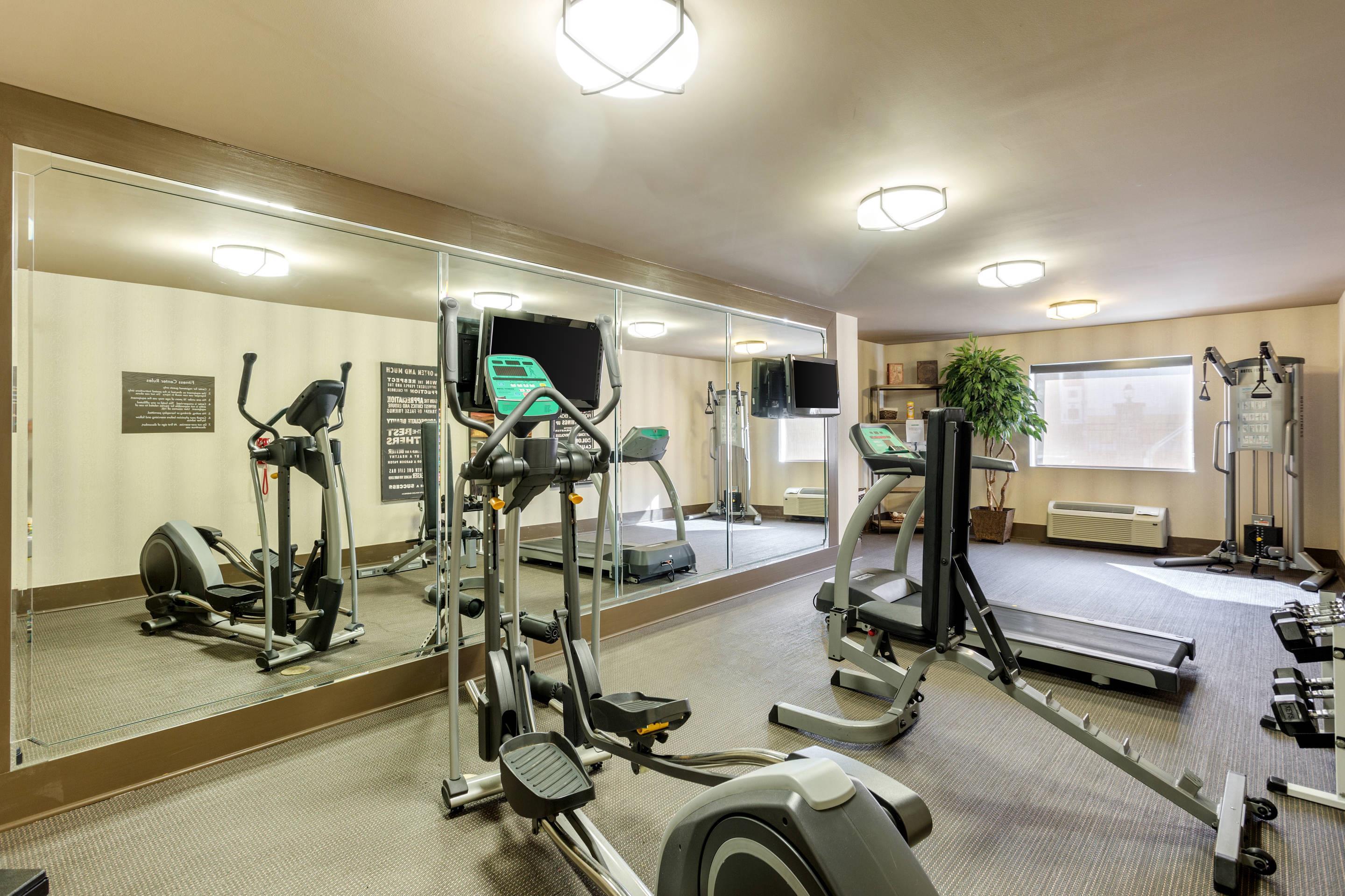 Exercise room with cardio equipment | Comfort Inn