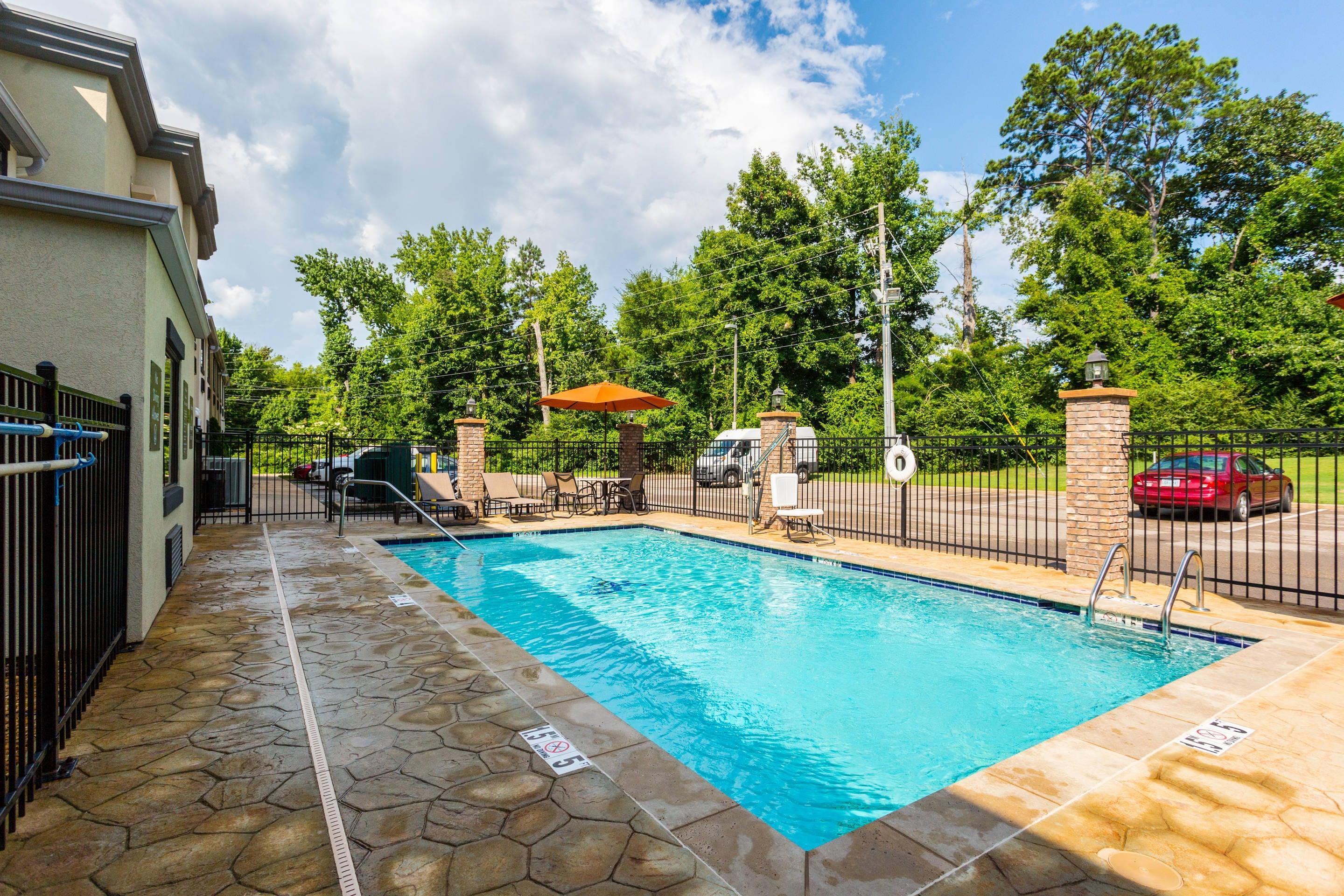 Relax by the pool | Comfort Inn