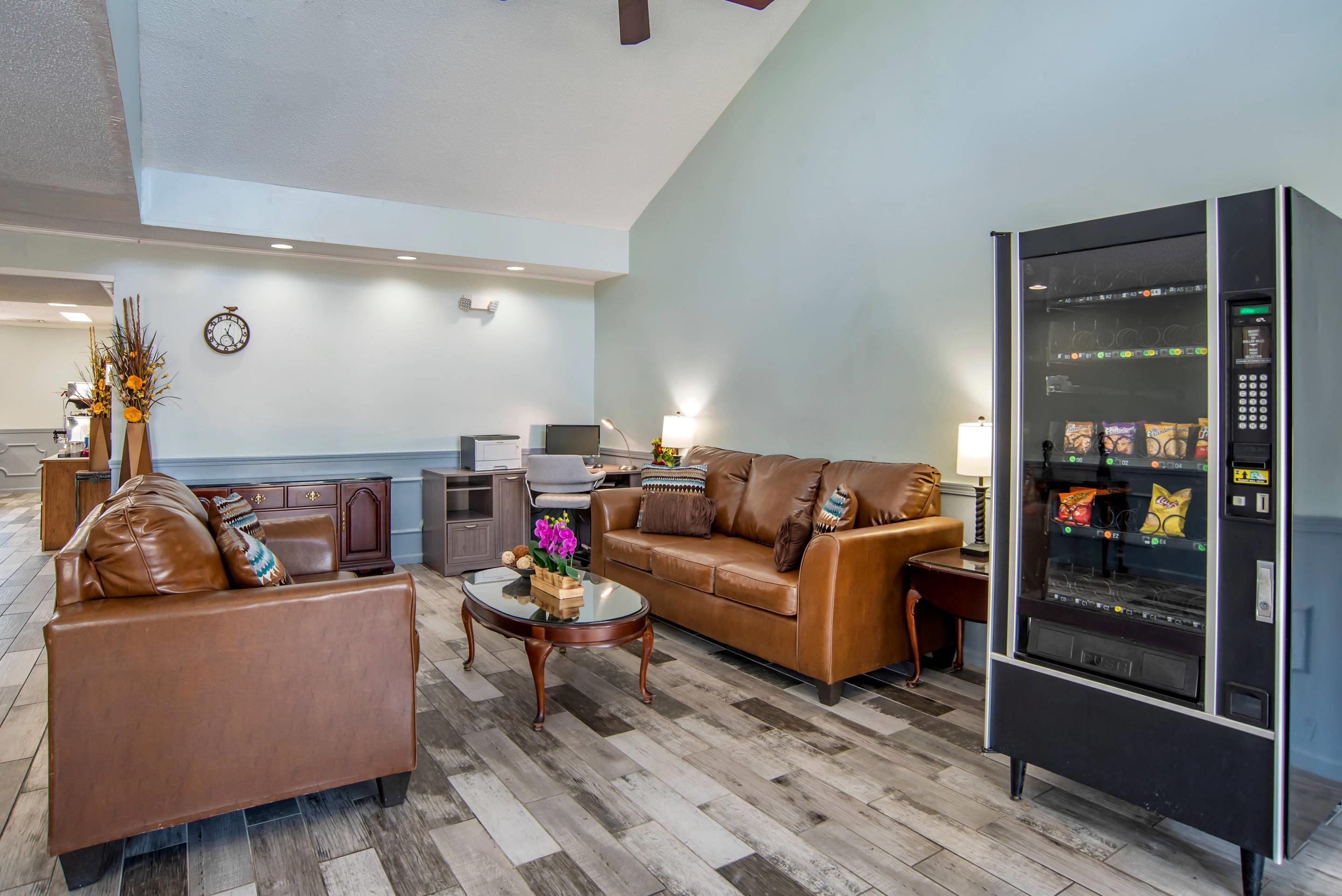 Spacious lobby with sitting area | Econo Lodge Tupelo