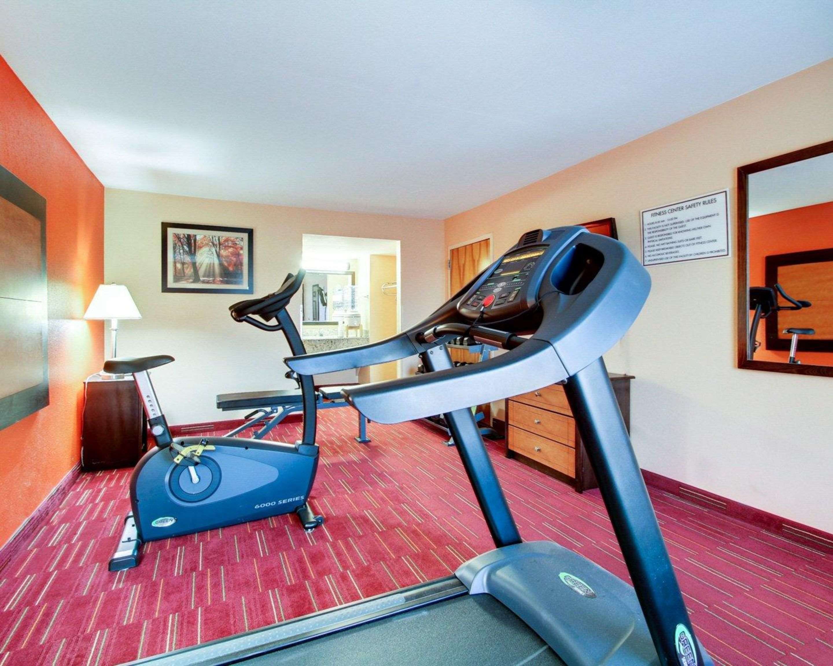 Fitness center with cardio equipment | Quality Inn