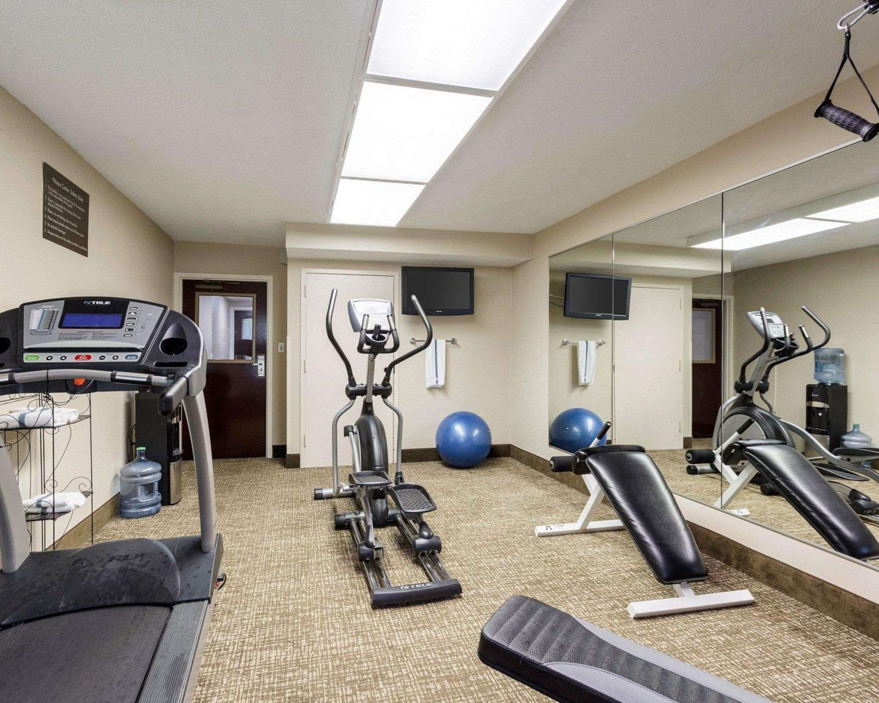 Fitness center with television | Quality Inn