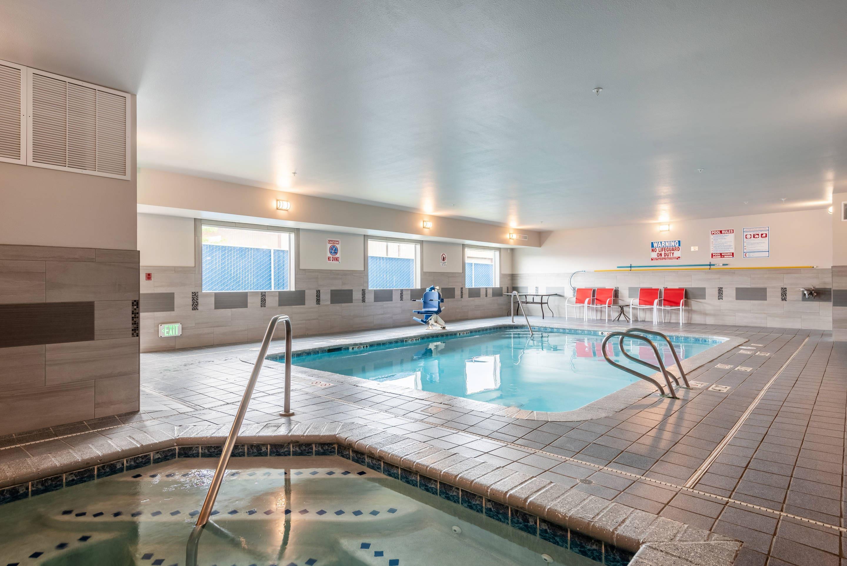 Indoor pool with hot tub | Quality Inn & Suites