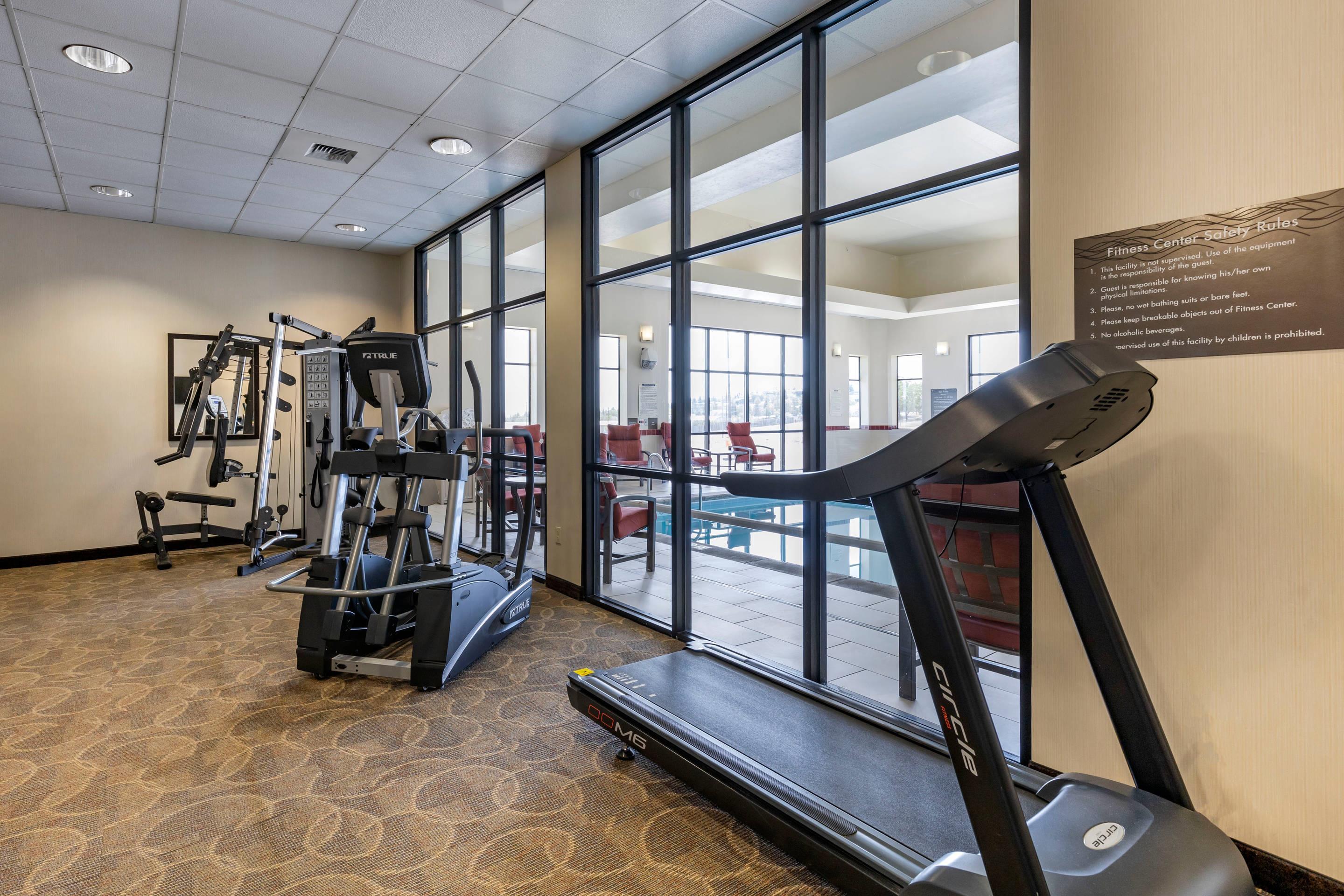 Exercise room with cardio equipment | Comfort Inn & Suites Gateway to Glacier National Park