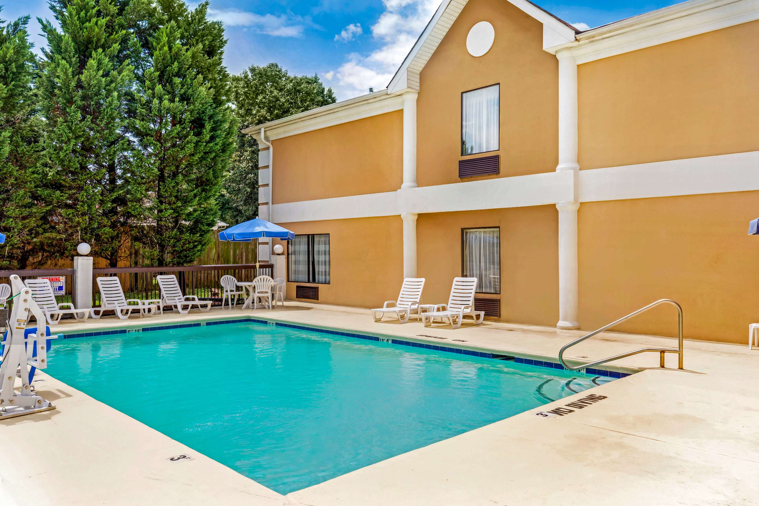 Outdoor pool | Quality Inn High Point - Archdale