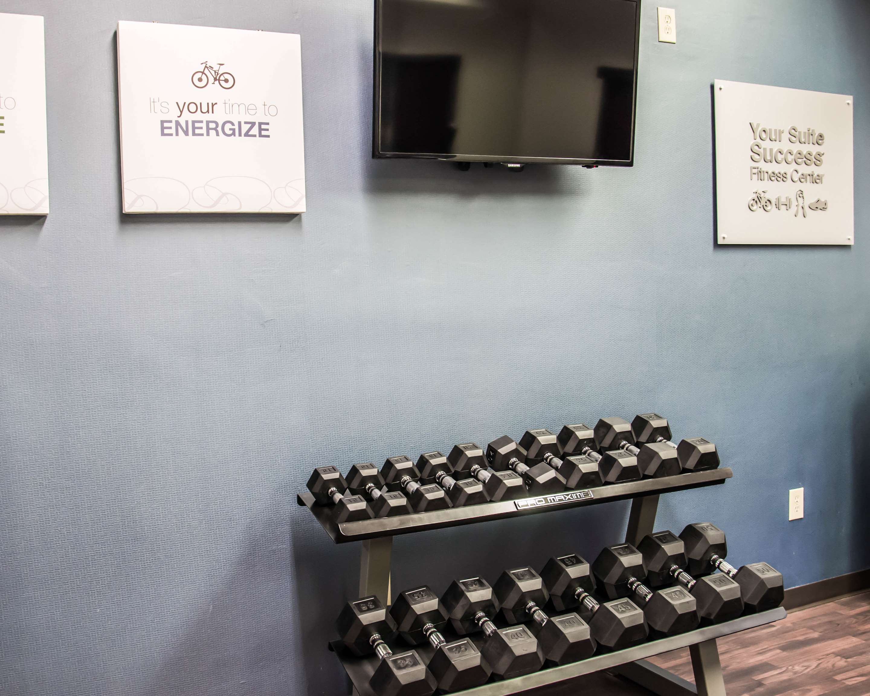 Fitness center with television | Comfort Suites Research Park - University