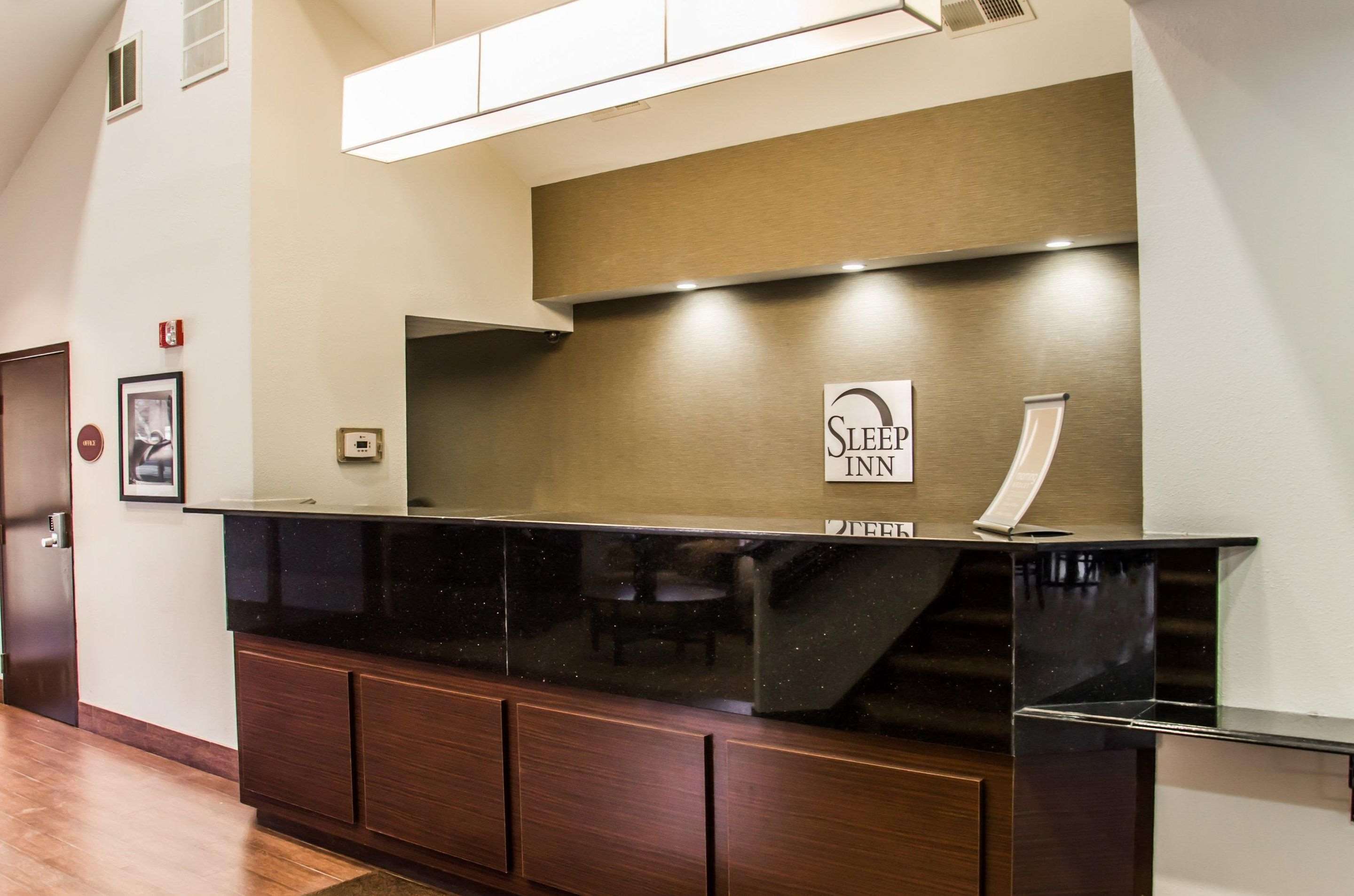 Front desk | Sleep Inn Airport - Billy Graham Parkway