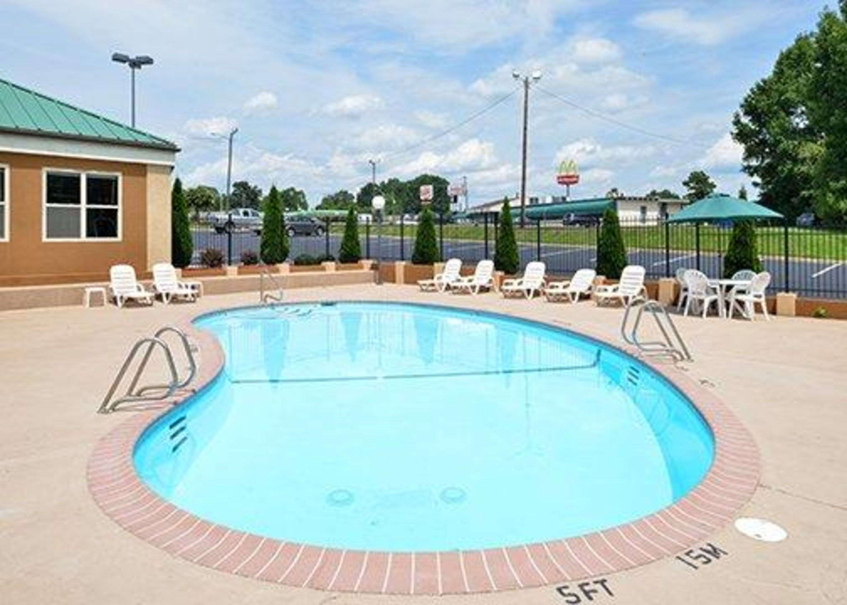 Outdoor pool with sundeck | Comfort Inn Asheboro