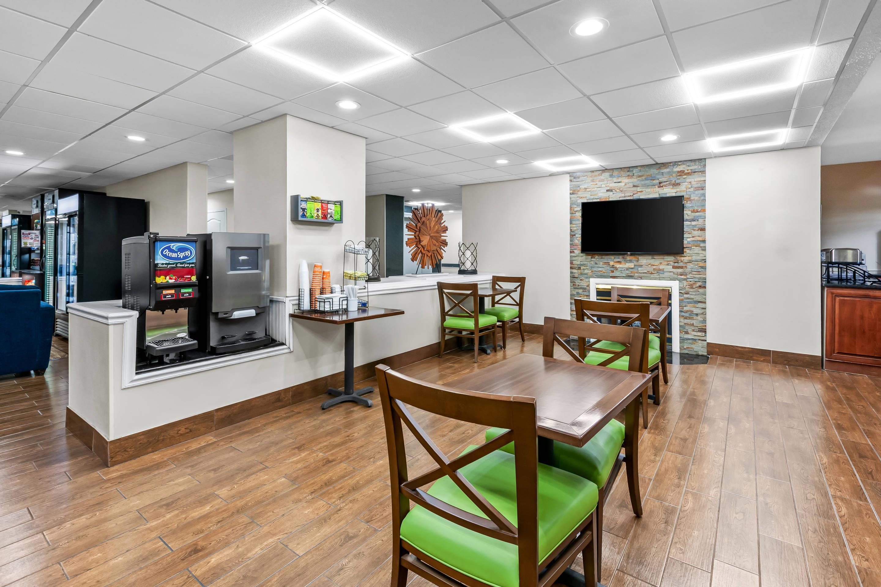 Enjoy breakfast in this seating area | Comfort Inn Laurinburg