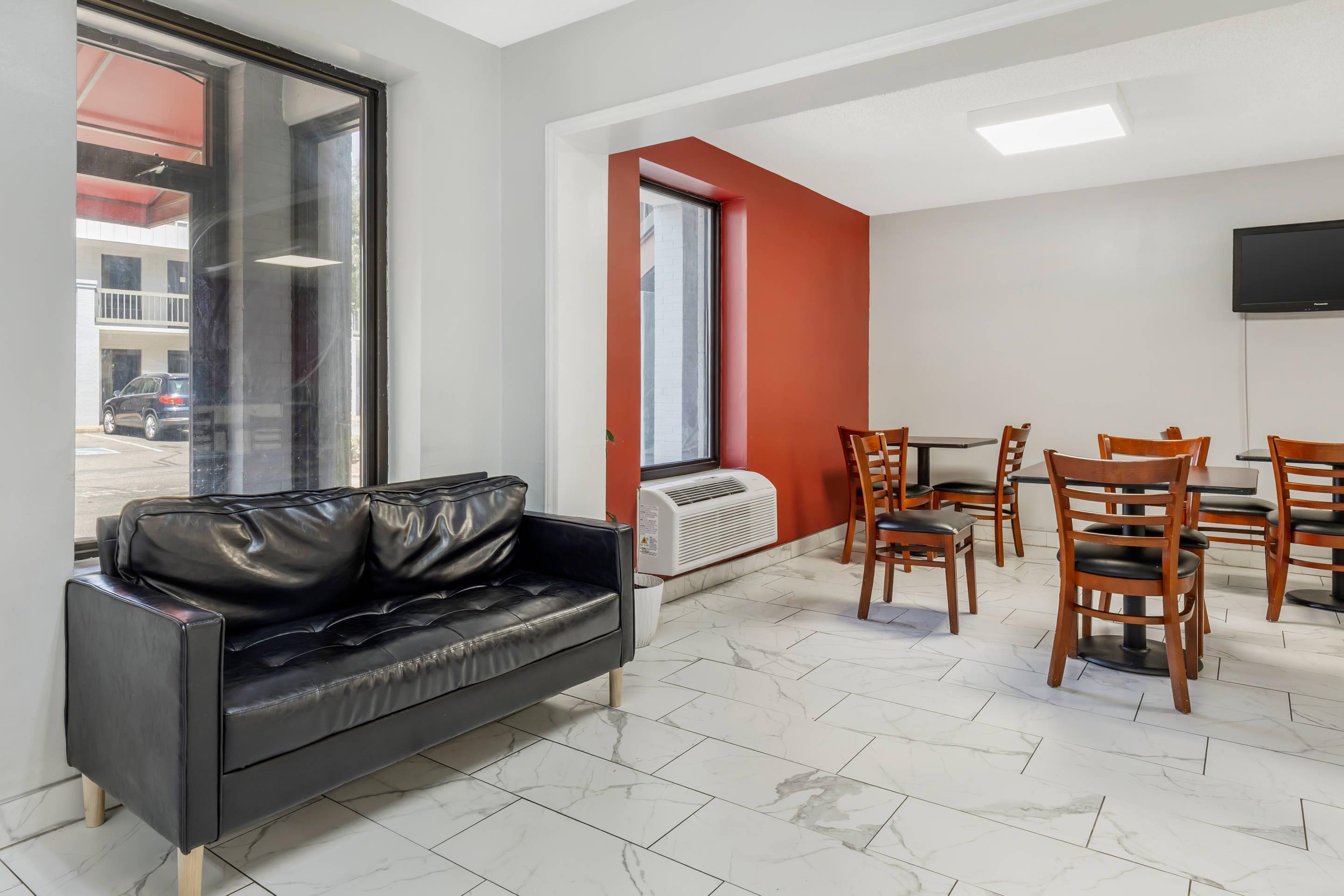 Lobby with sitting area | Econo Lodge Research Triangle Park