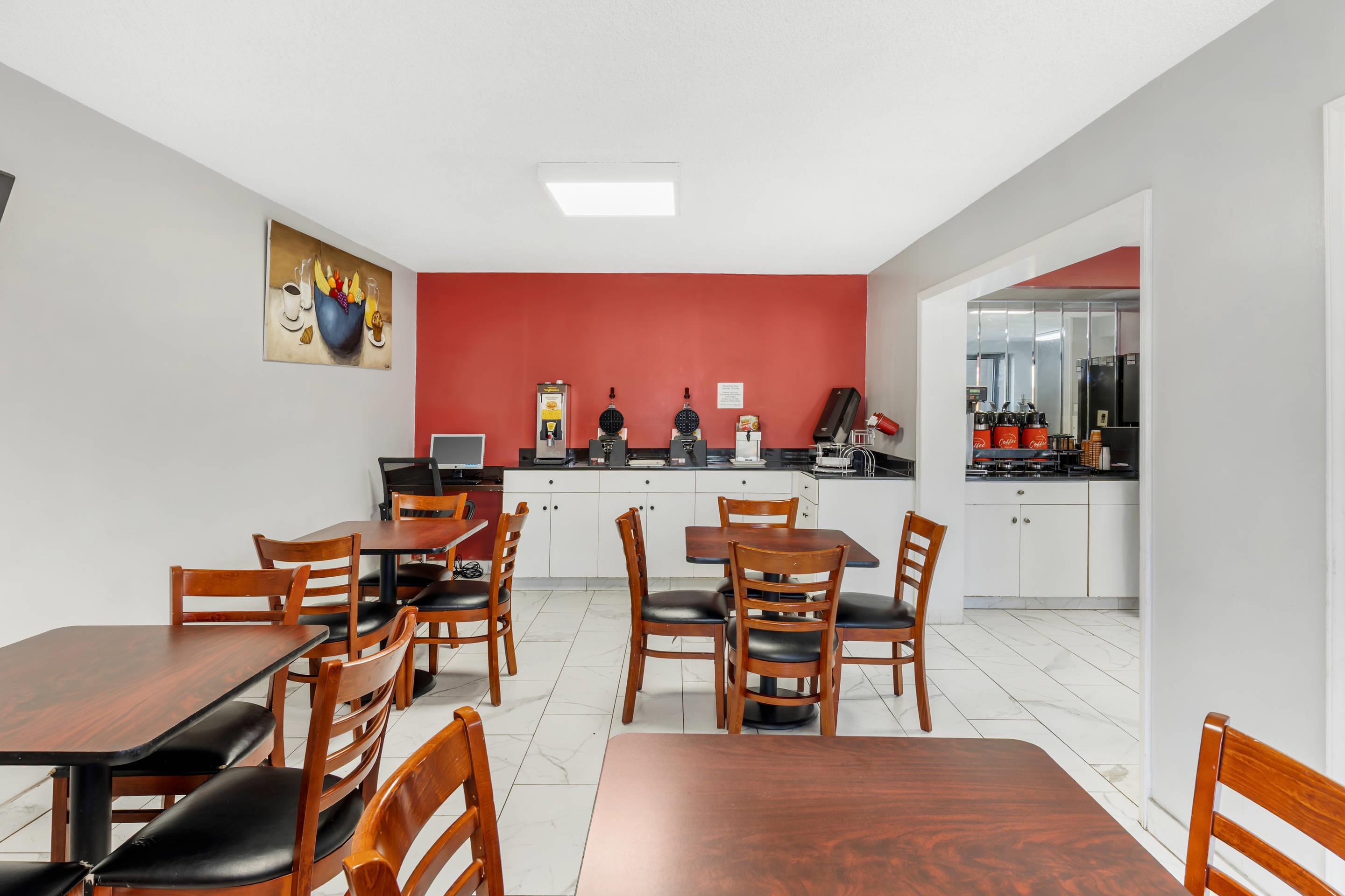 Enjoy breakfast in this seating area | Econo Lodge Research Triangle Park