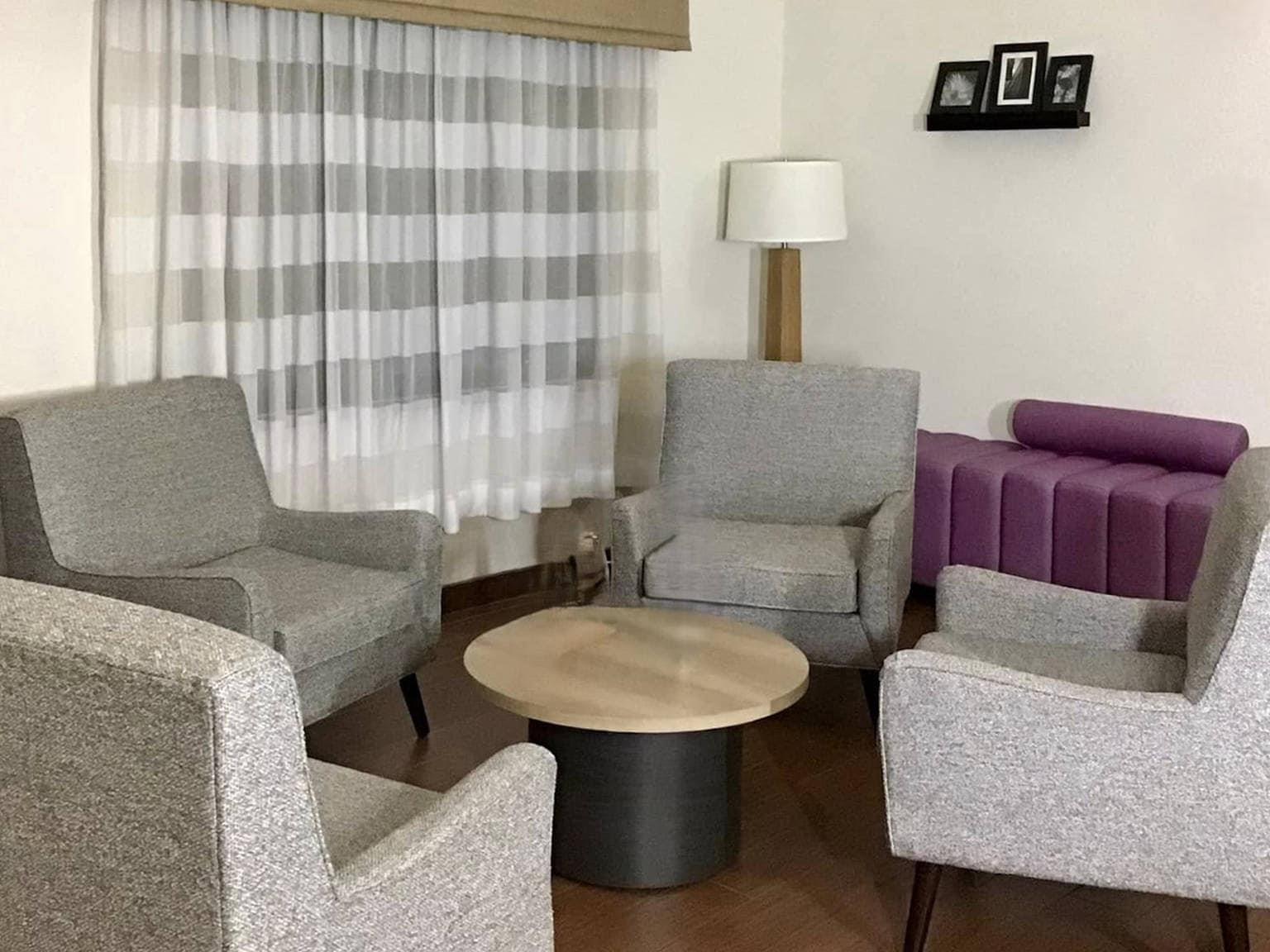 Lobby with sitting area | Sleep Inn & Suites Spring Lake - Fayetteville Near Fort Liberty