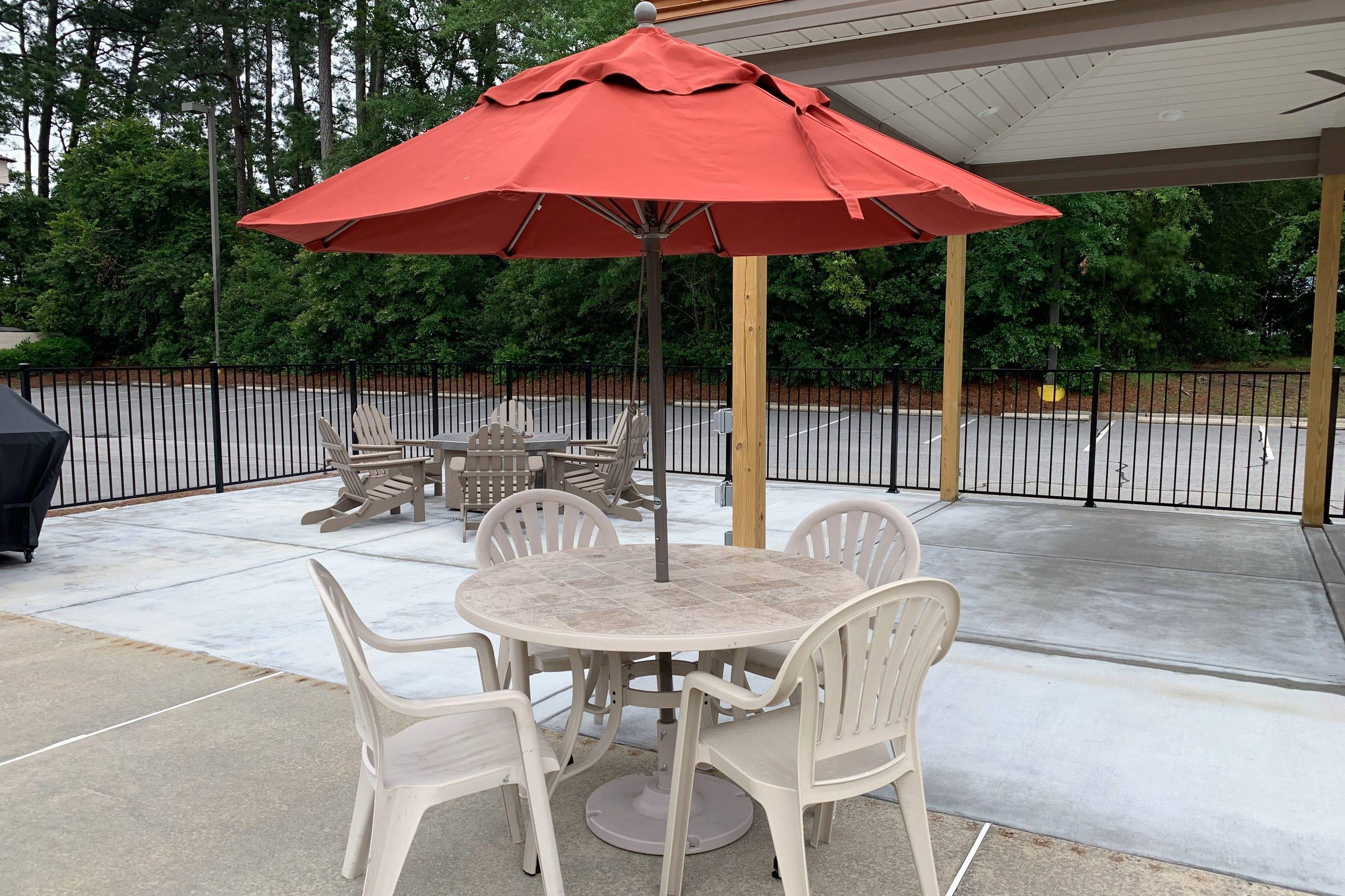 Hotel patio and firepit area | Sleep Inn & Suites Spring Lake - Fayetteville Near Fort Liberty