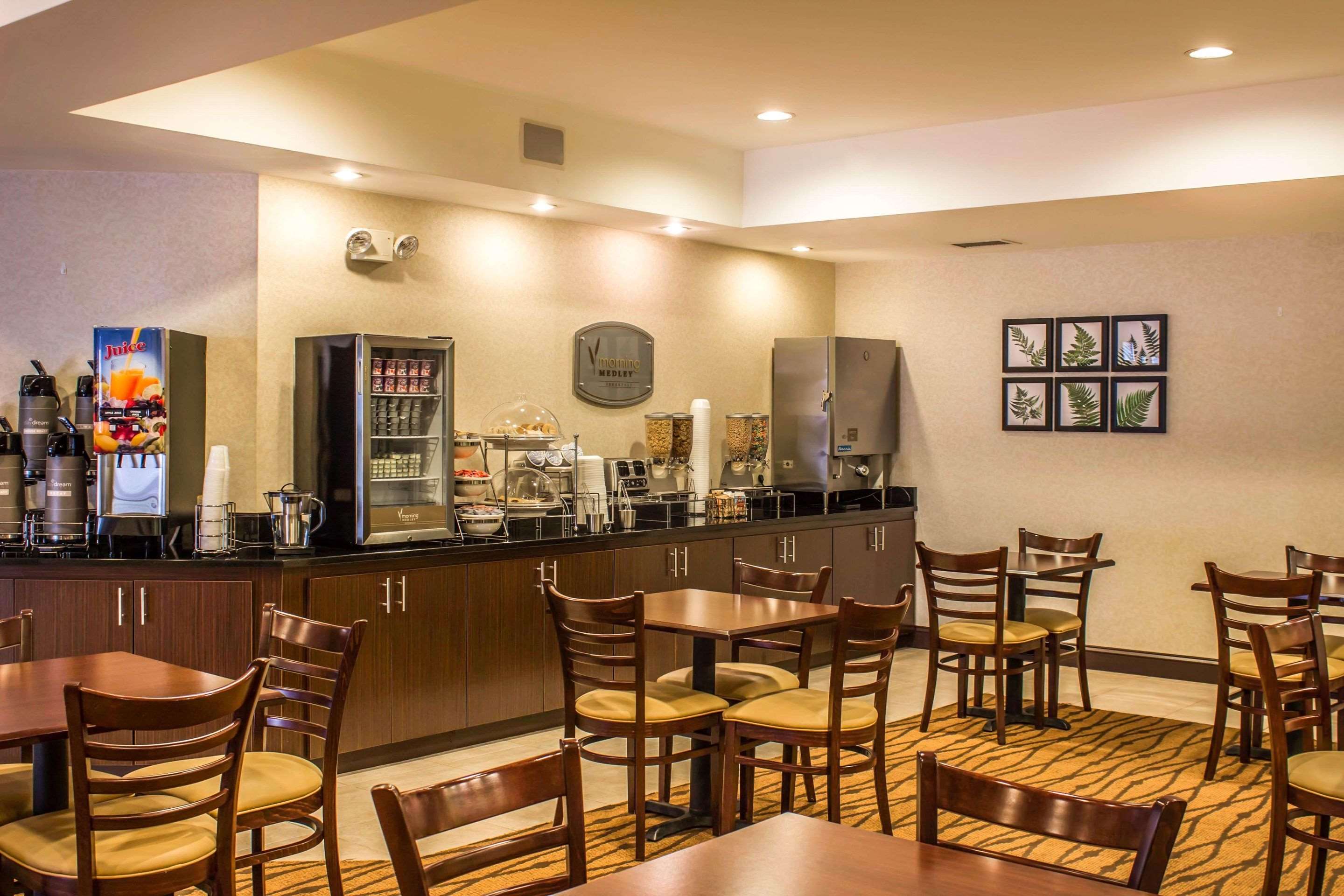 Enjoy breakfast in this seating area | Sleep Inn Raleigh Durham Airport