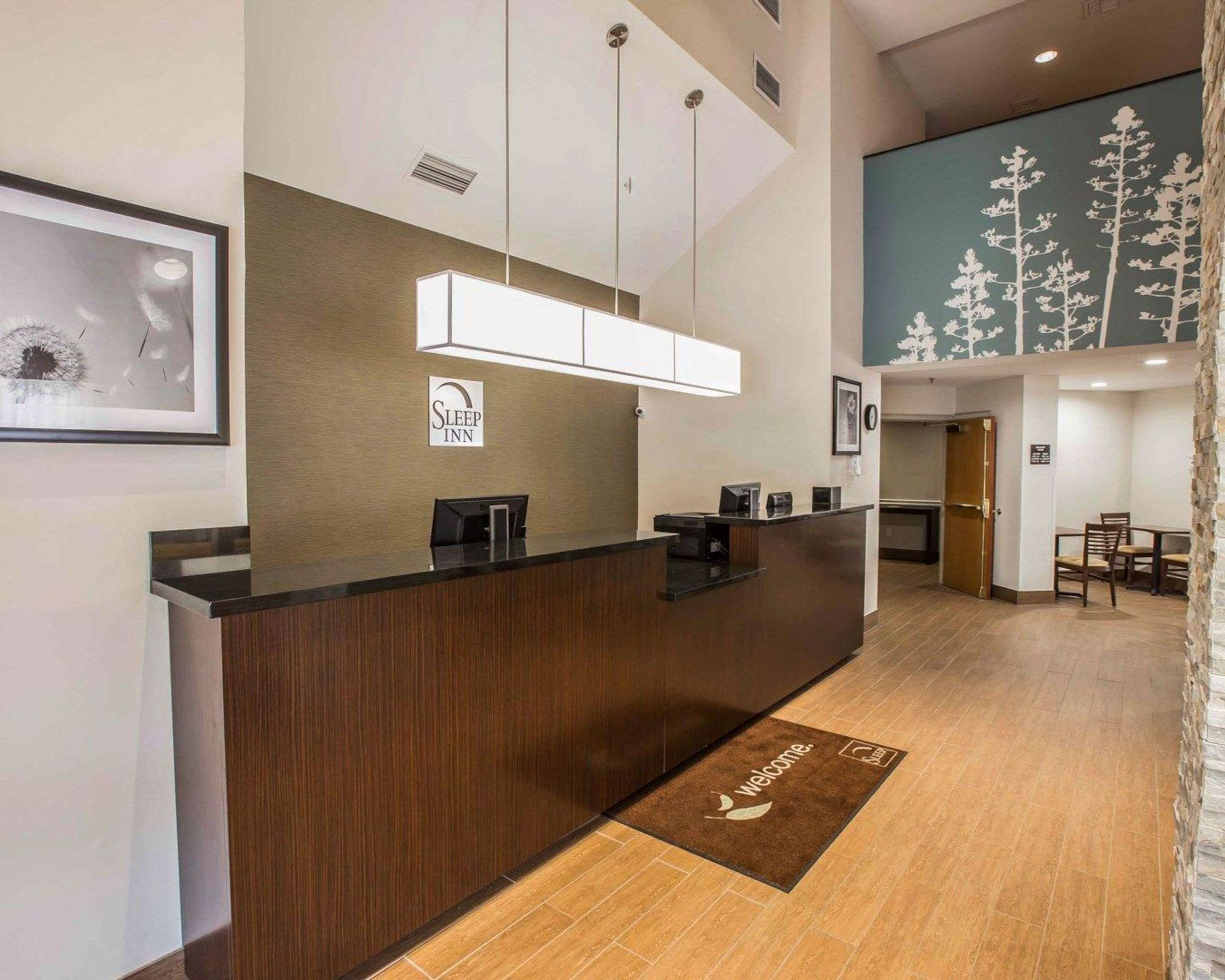 Front desk with friendly staff | Sleep Inn Airport