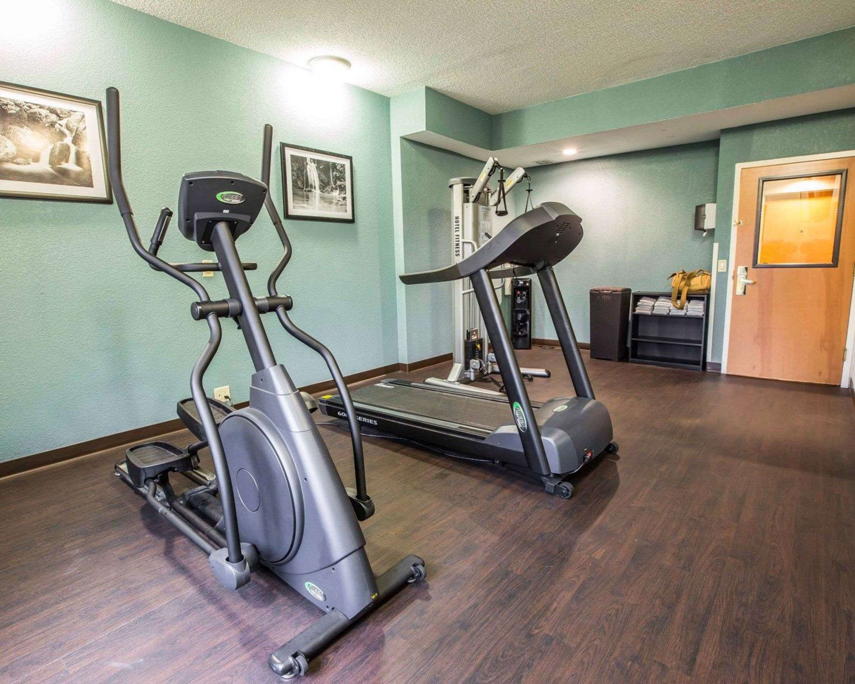 Fitness center with cardio equipment | Sleep Inn Airport