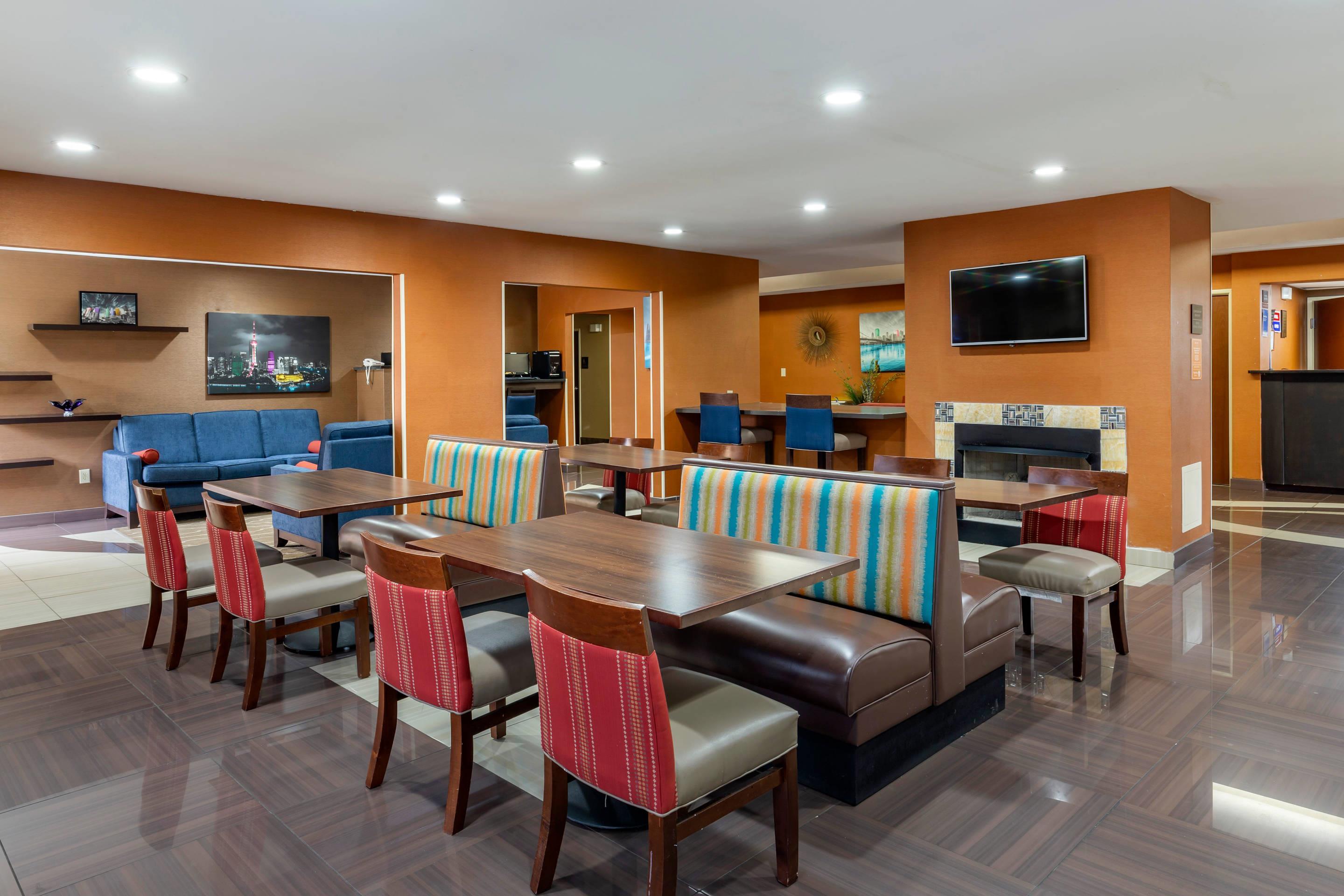 Enjoy breakfast in this seating area | Comfort Inn Garner Clayton I-40