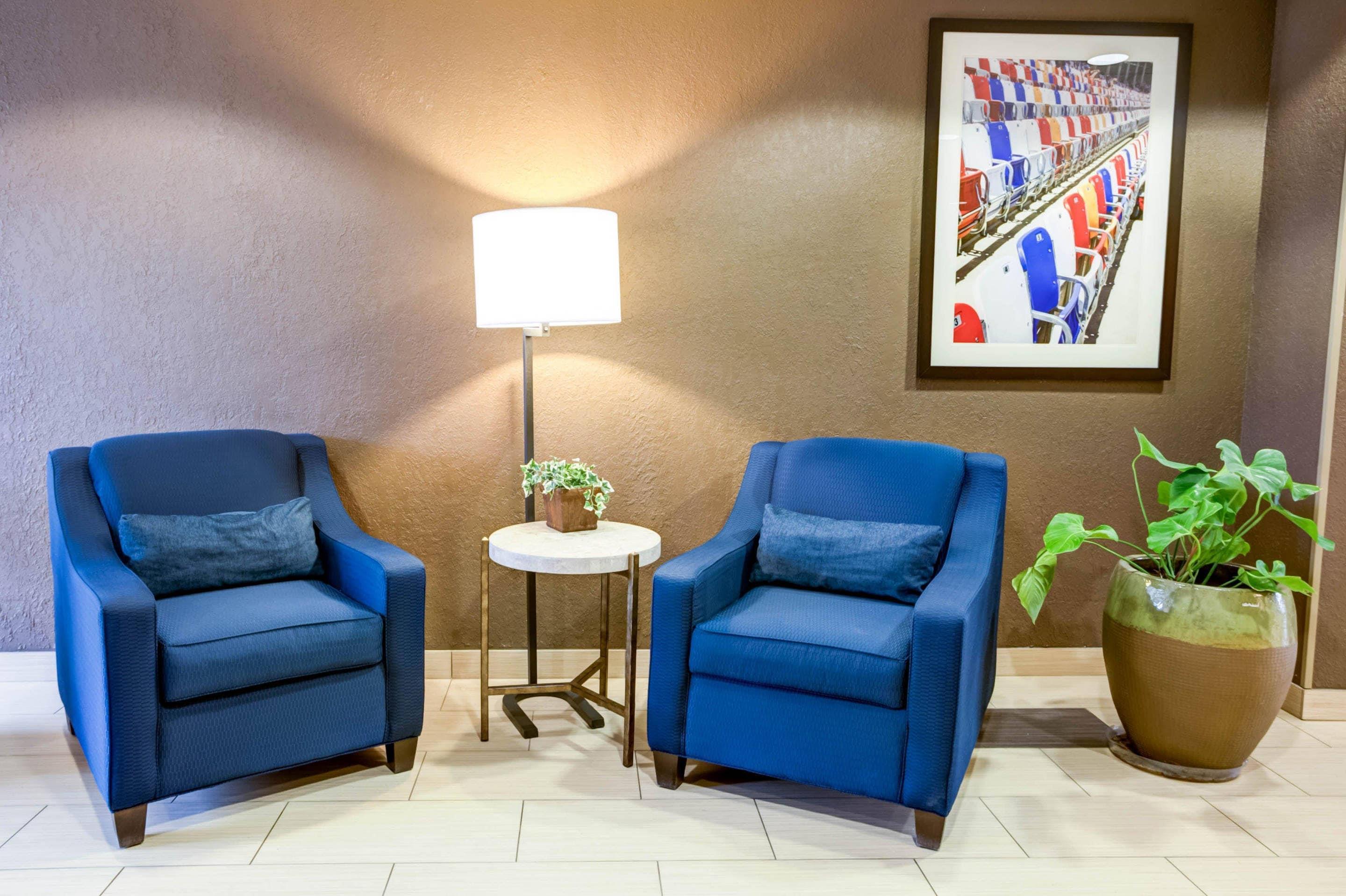 Spacious lobby with sitting area | Comfort Suites Concord Mills