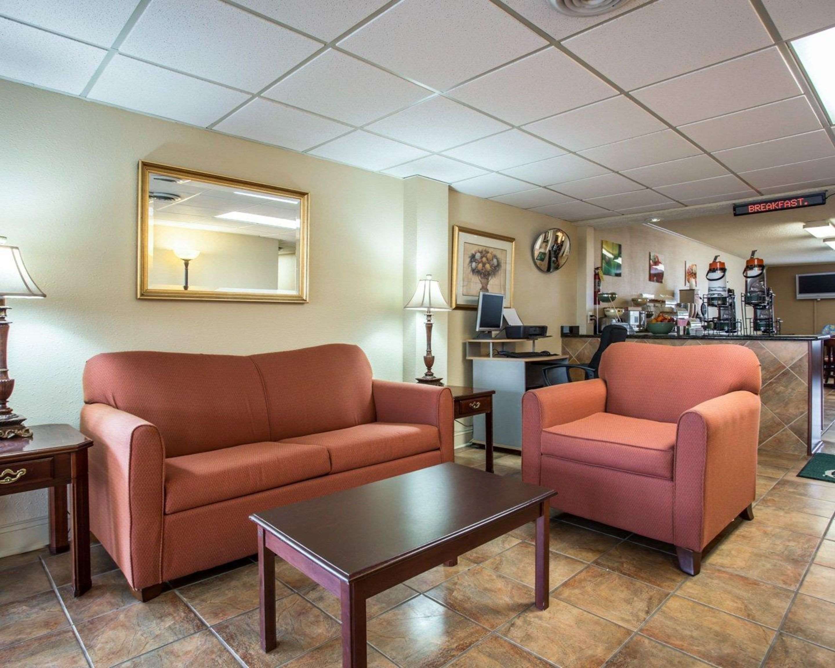 Spacious lobby with sitting area | Quality Inn & Suites Monroe